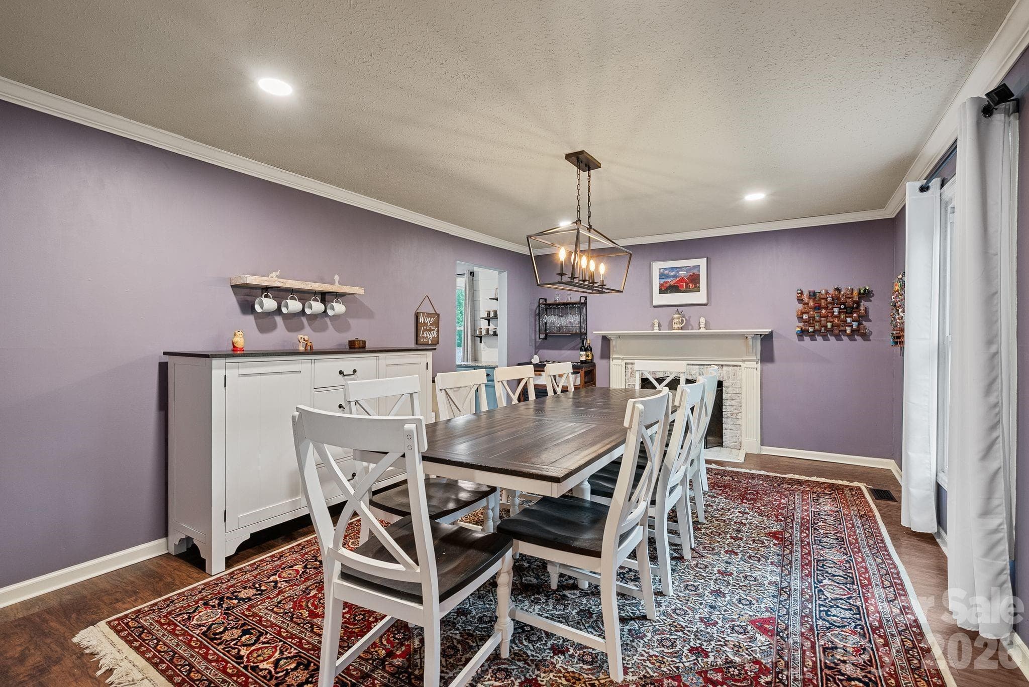 This dining room features 1 of the home's 2 wood burning fireplaces - would also make lovely formal living room! - 4 Beechwood Lakes Drive, Hendersonville