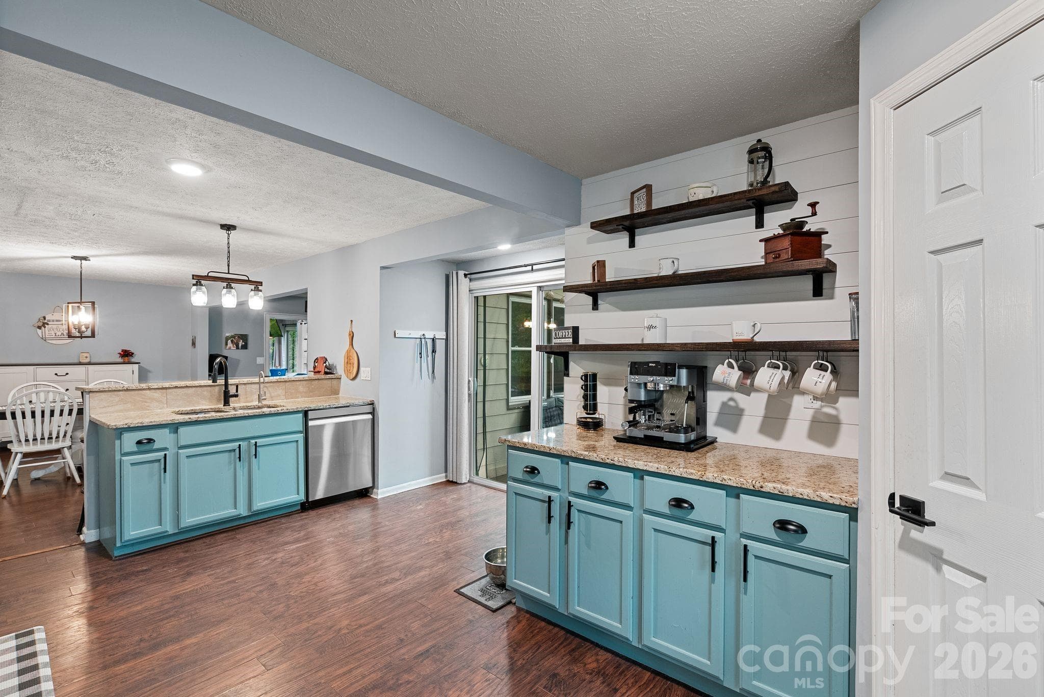 This awesome kitchen features new appliances, plenty of counter space and storage including pantry! - 4 Beechwood Lakes Drive, Hendersonville