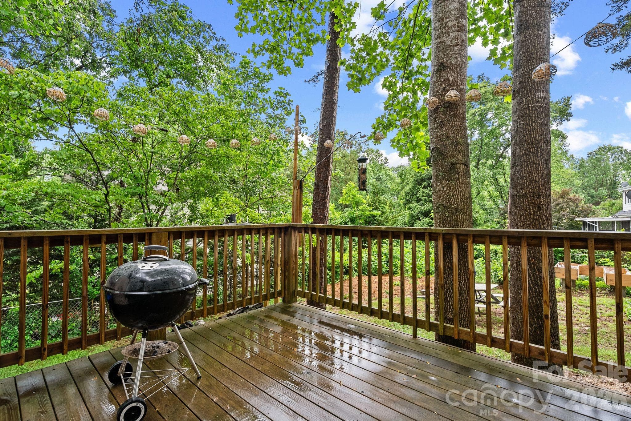 Step onto the deck outside your kitchen to access your grilling deck! - 4 Beechwood Lakes Drive, Hendersonville