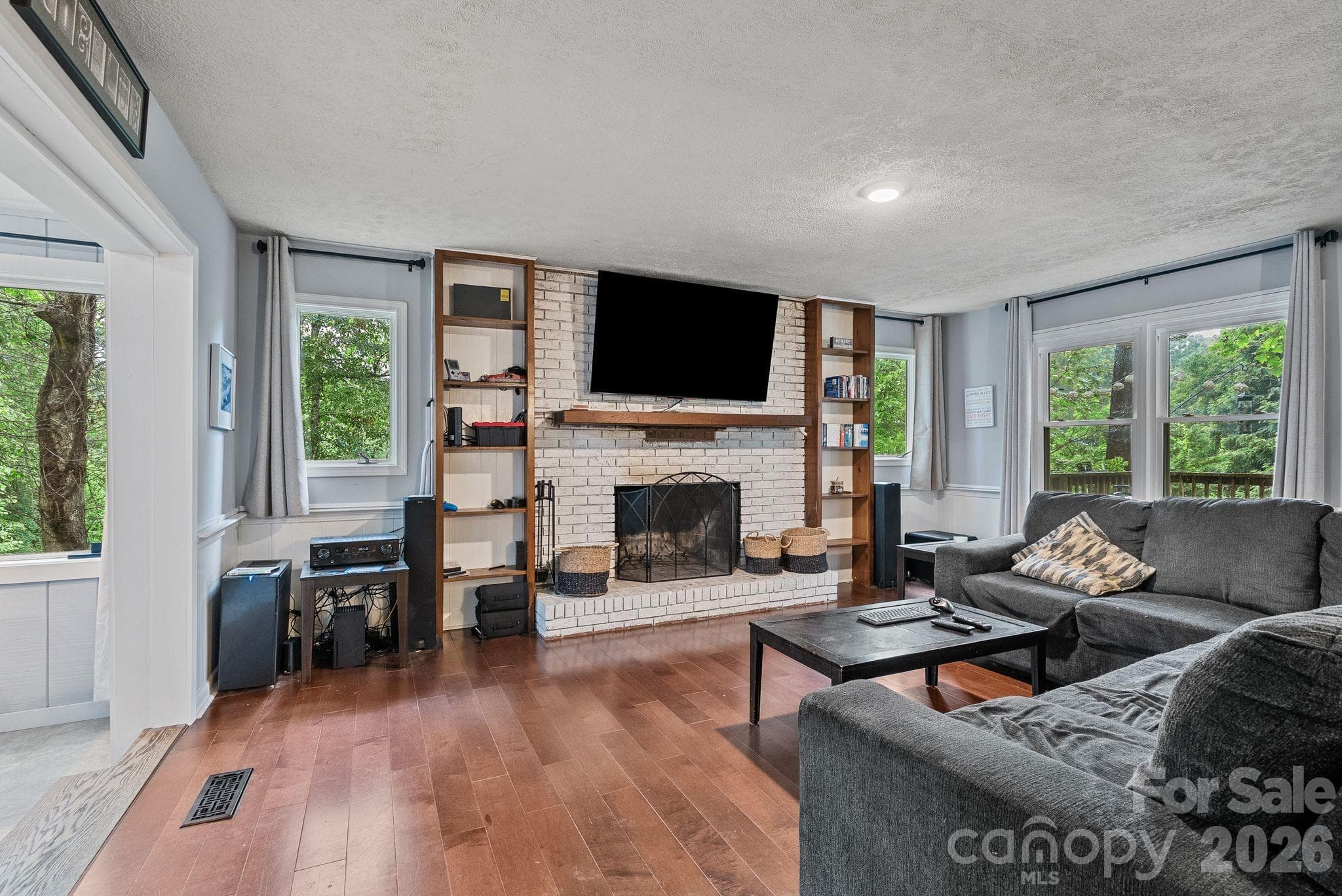 Woodburning fireplace number two - such a cozy home with lovely spaces to gather! - 4 Beechwood Lakes Drive, Hendersonville