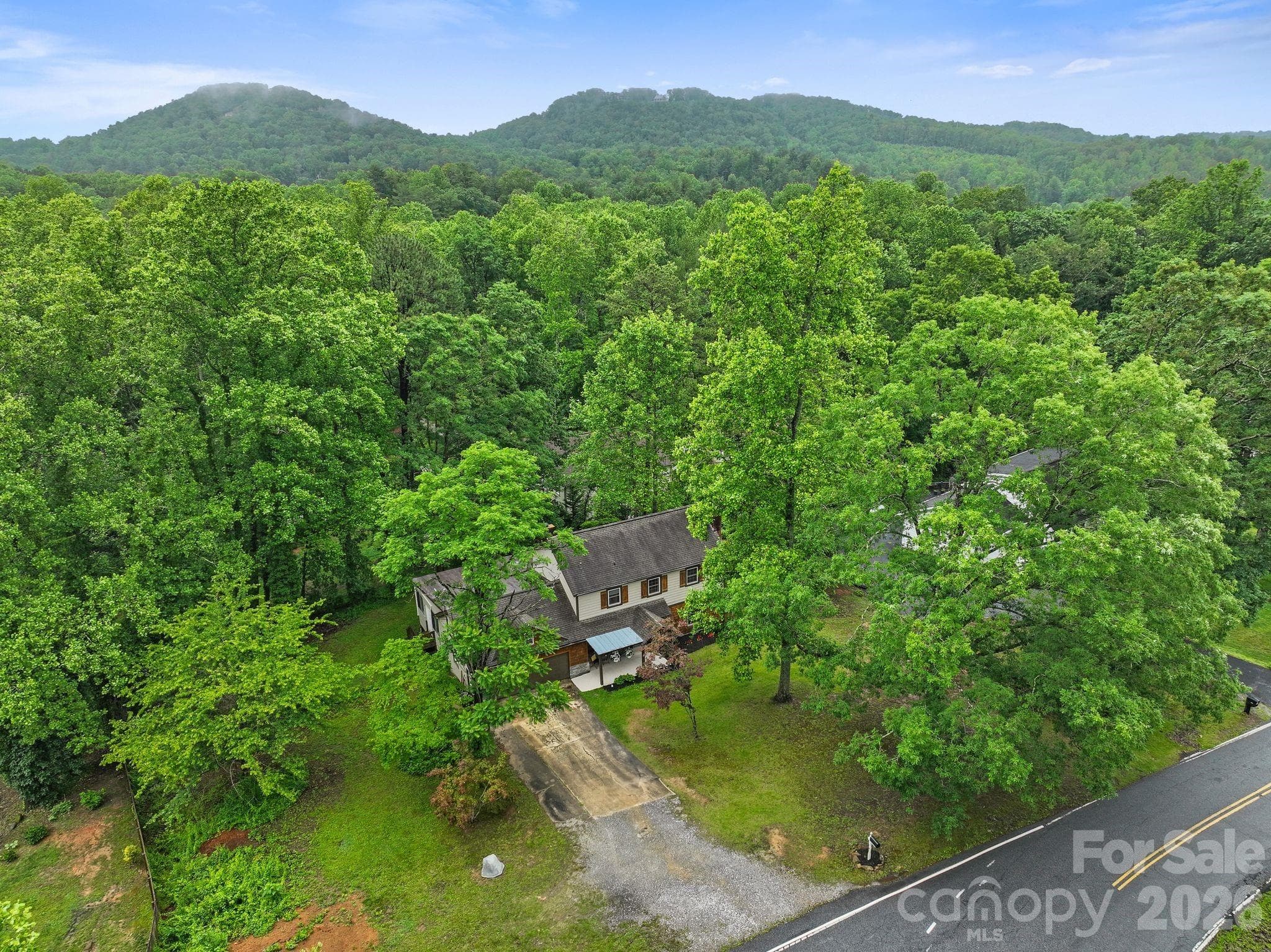 Note the ample parking - PLUS a 2 car garage! - 4 Beechwood Lakes Drive, Hendersonville