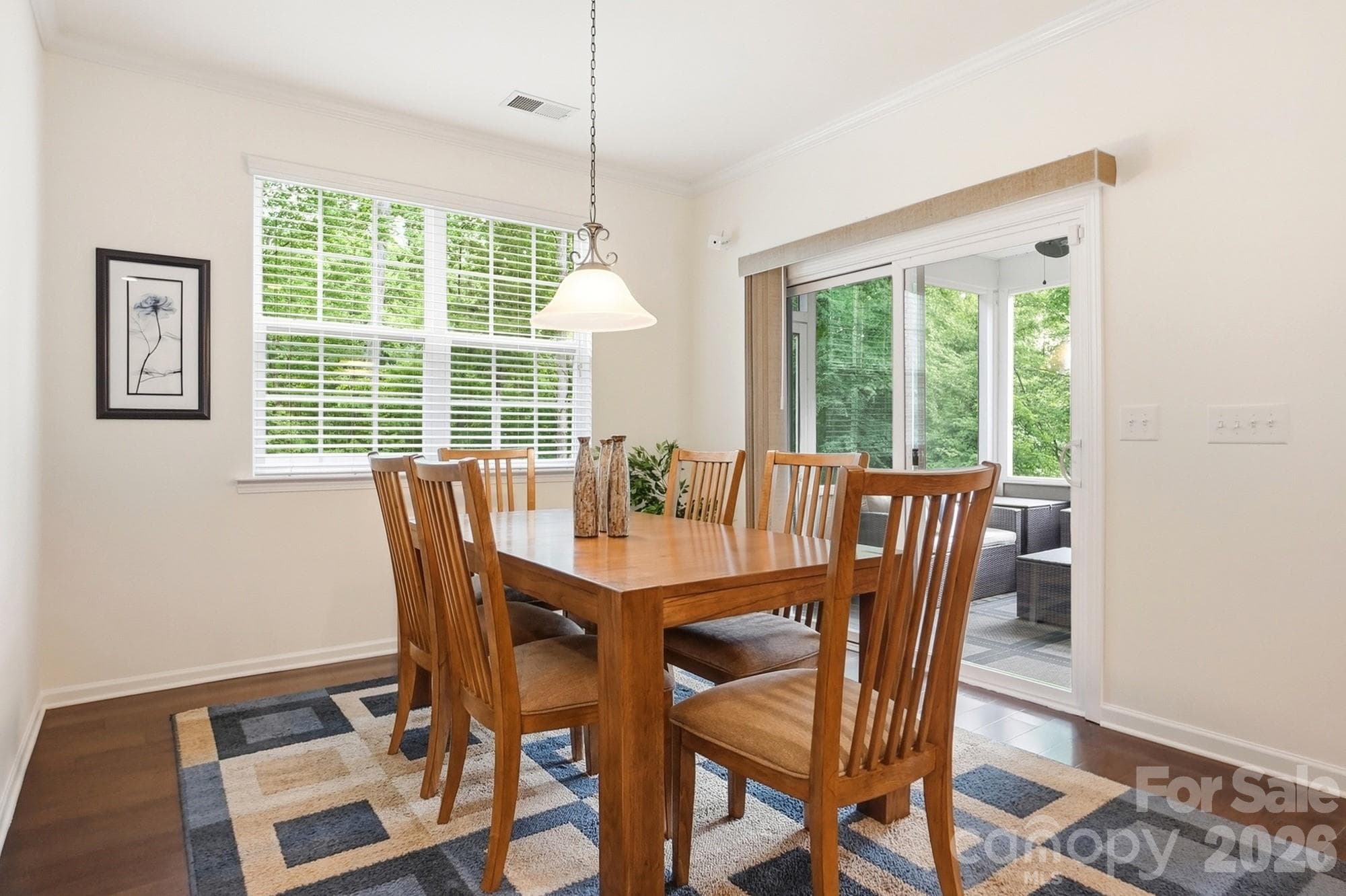 Kitchen eating area leads out to the screened-in-porch - 1413 Screech Owl Road, Waxhaw