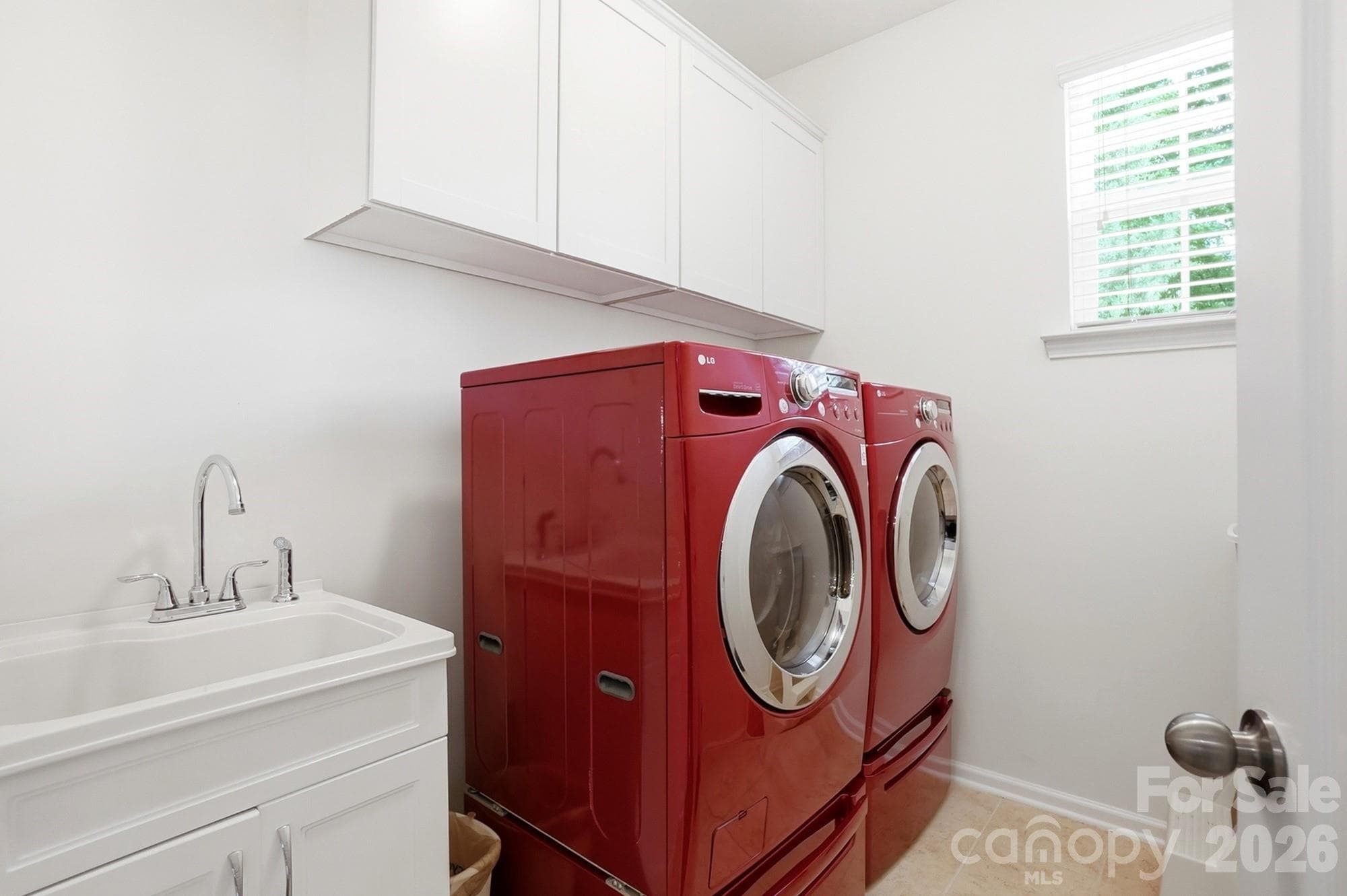 Large Laundry with sink and cabinets! - 1413 Screech Owl Road, Waxhaw