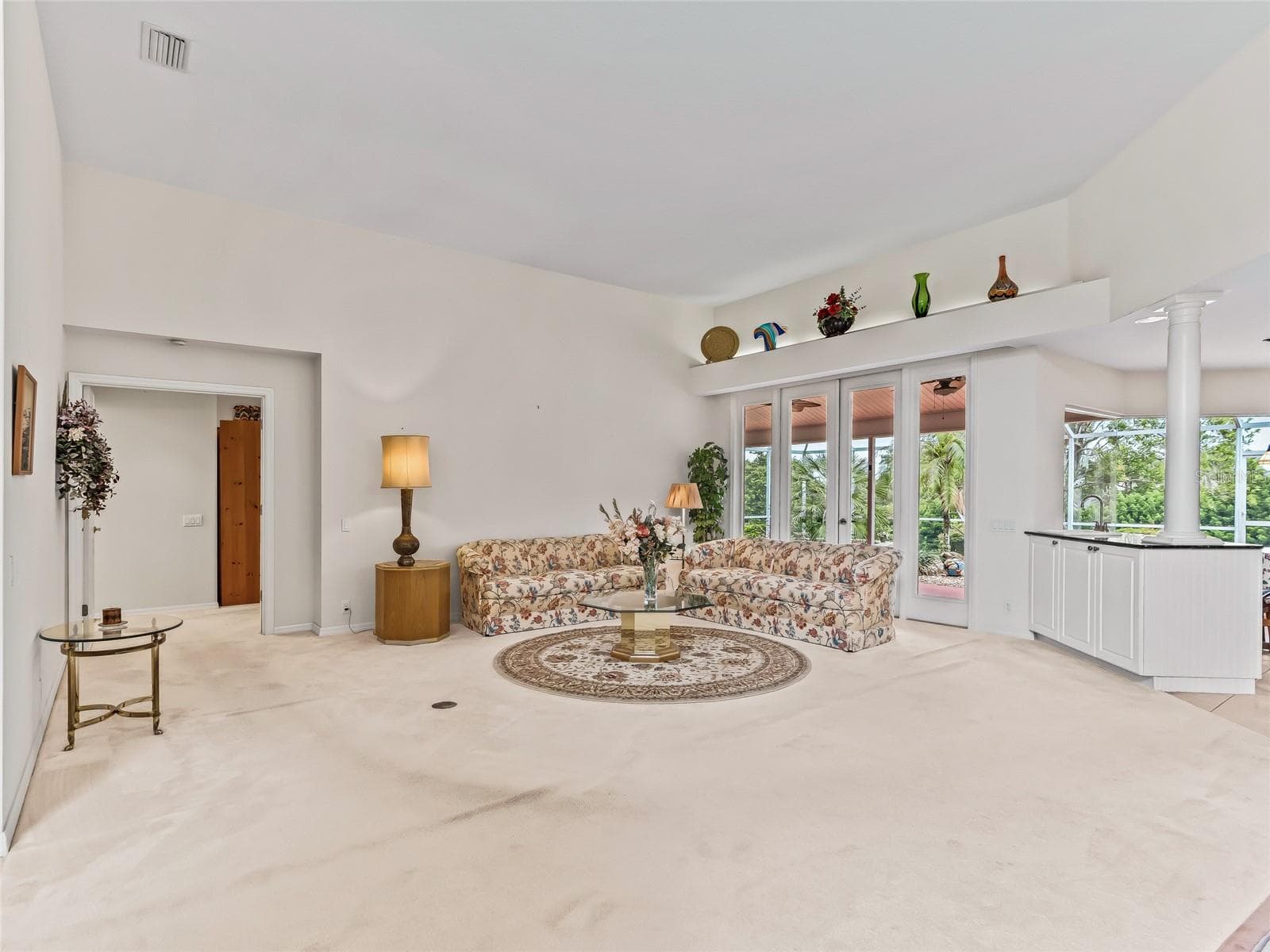 Pretty french doors in Living room - 5321 GREENS DR, LADY LAKE