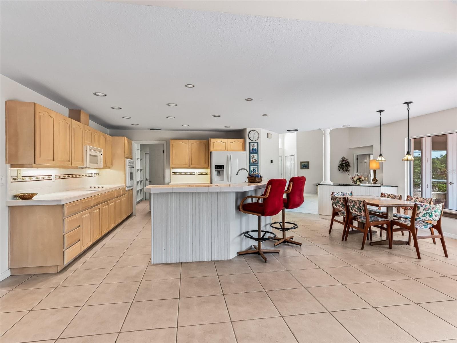 Kitchen is large with breakfast bar - 5321 GREENS DR, LADY LAKE