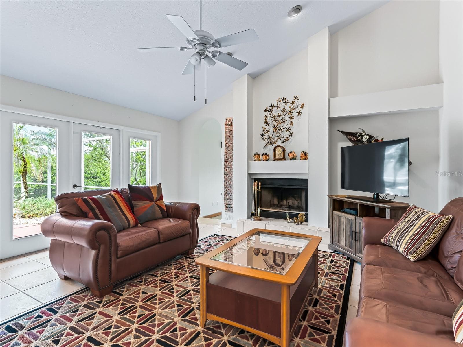 Family room has a french door to lanai - 5321 GREENS DR, LADY LAKE