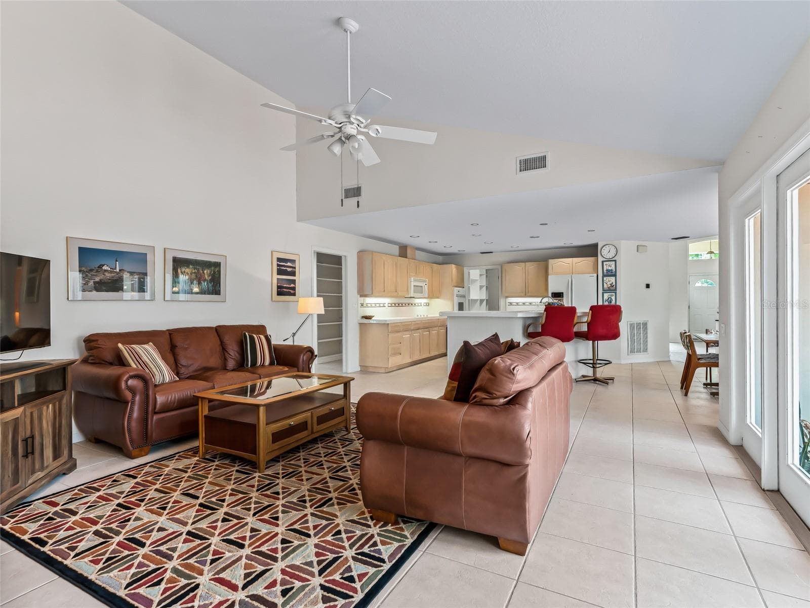 Family room looking into kitchen - 5321 GREENS DR, LADY LAKE