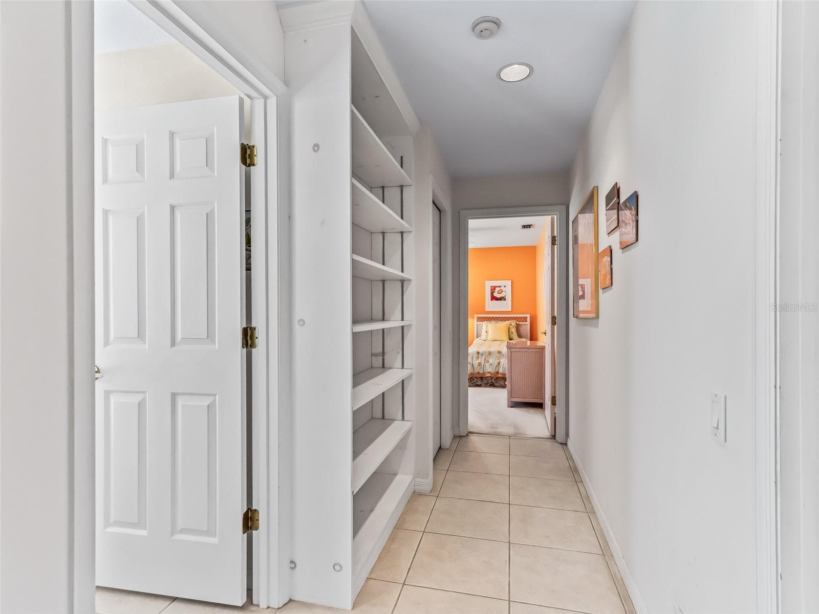 Hall between 2 additional bedrooms - 5321 GREENS DR, LADY LAKE
