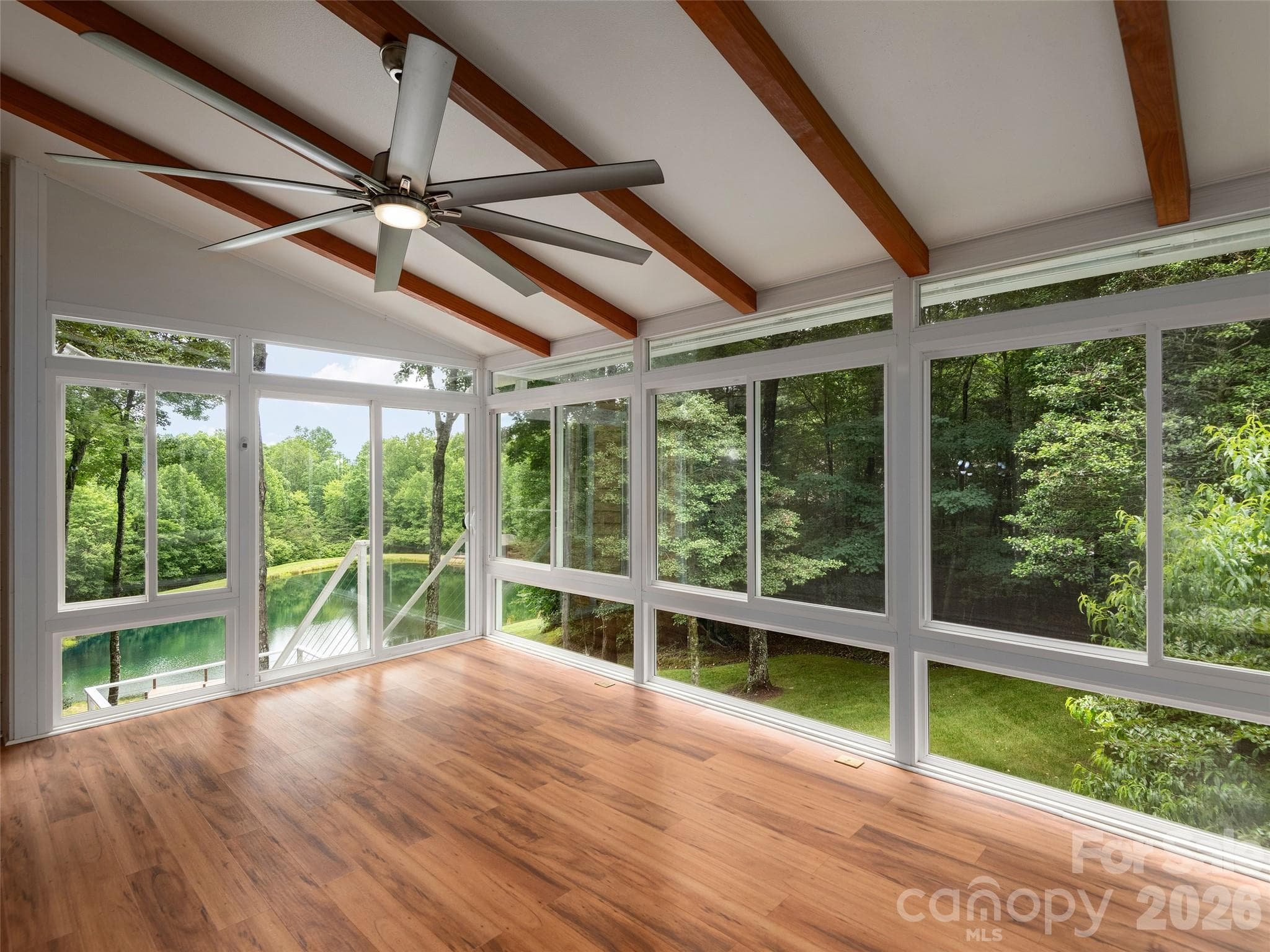 Sunroom overlooking community fishing pond - 48 Smokemont Drive, Arden