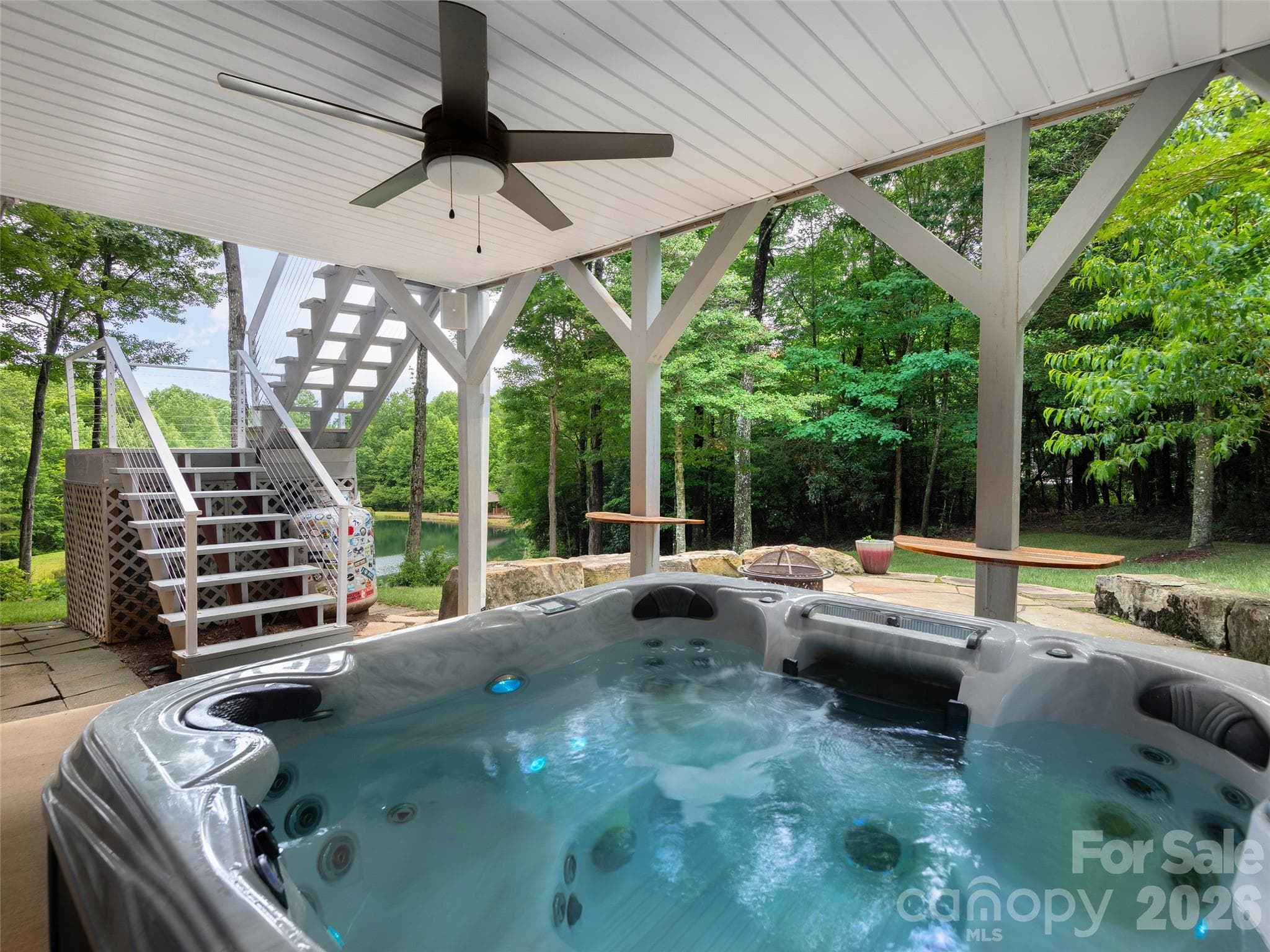Hot tub with view of community pond - 48 Smokemont Drive, Arden