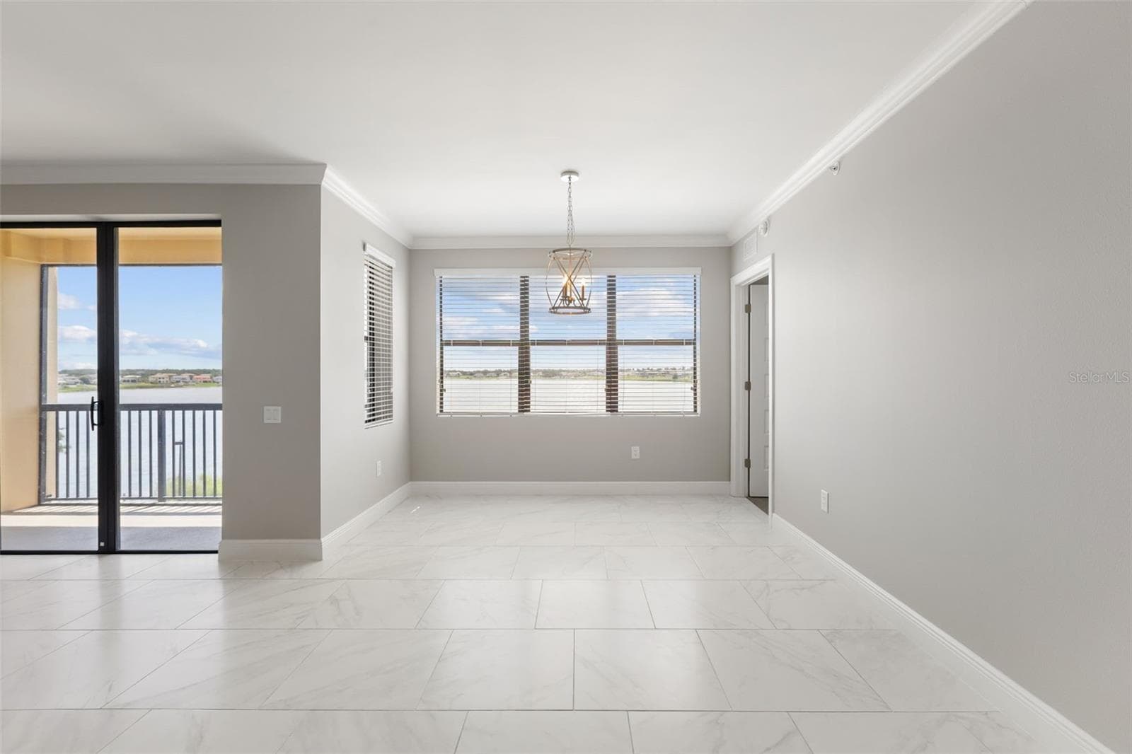 Living Room With Balcony Access - 16300 COUNTY ROAD 455 #410, MONTVERDE