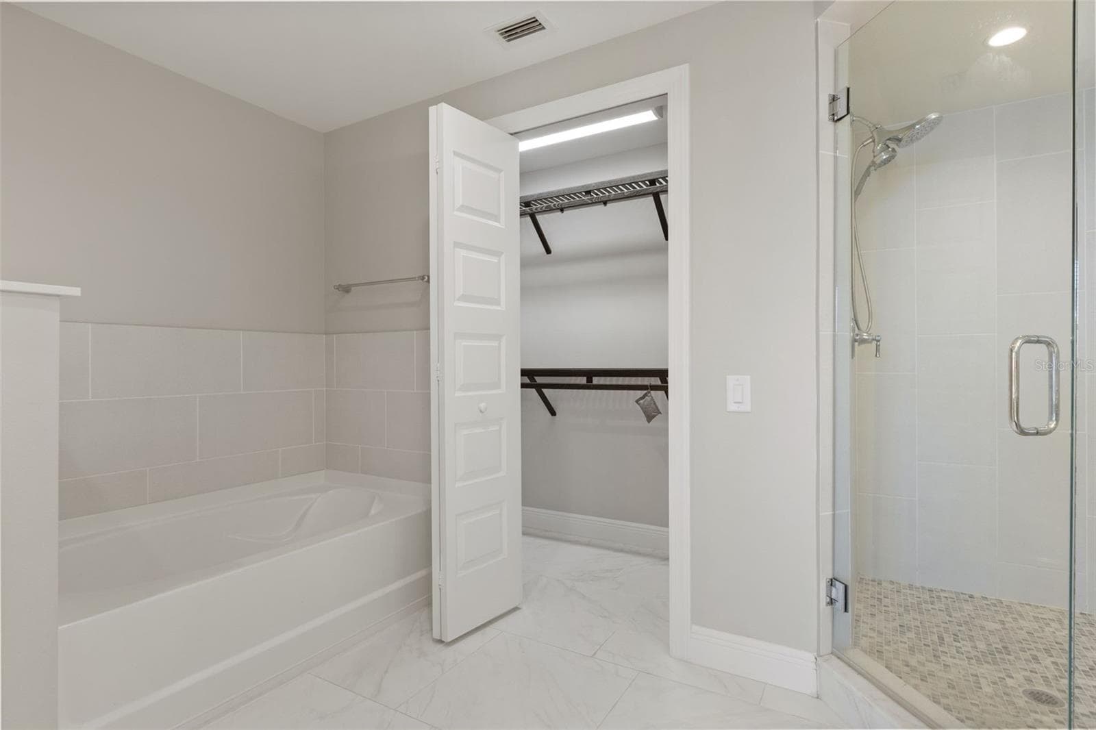 Primary Bathroom With Frameless Glass Shower - 16300 COUNTY ROAD 455 #410, MONTVERDE