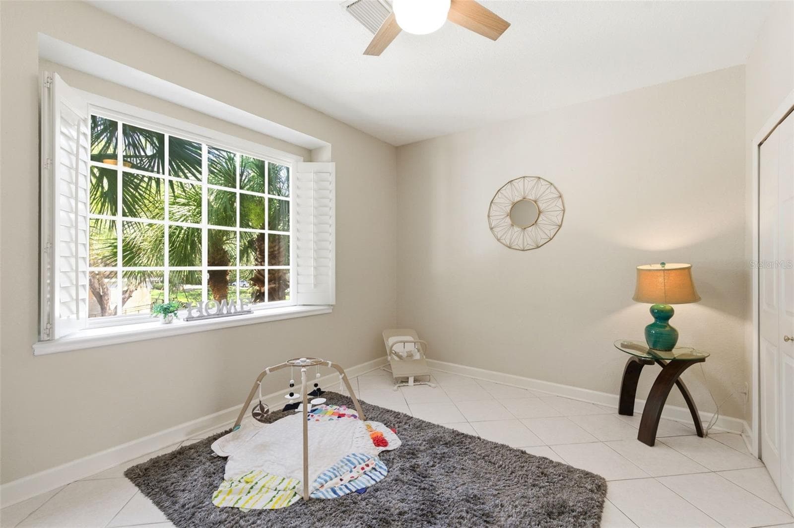 Great flex room with abundant natural light adorned with plantation shutters - 117 BRENT CIR, OLDSMAR