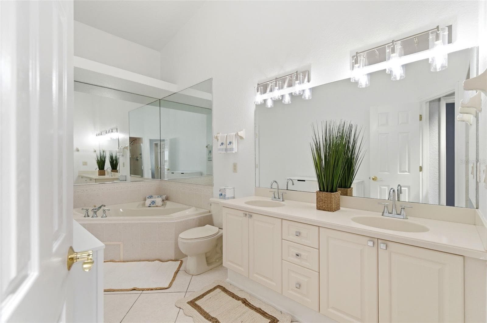 Primary bath with bath tub as well as a huge walk in shower - 117 BRENT CIR, OLDSMAR