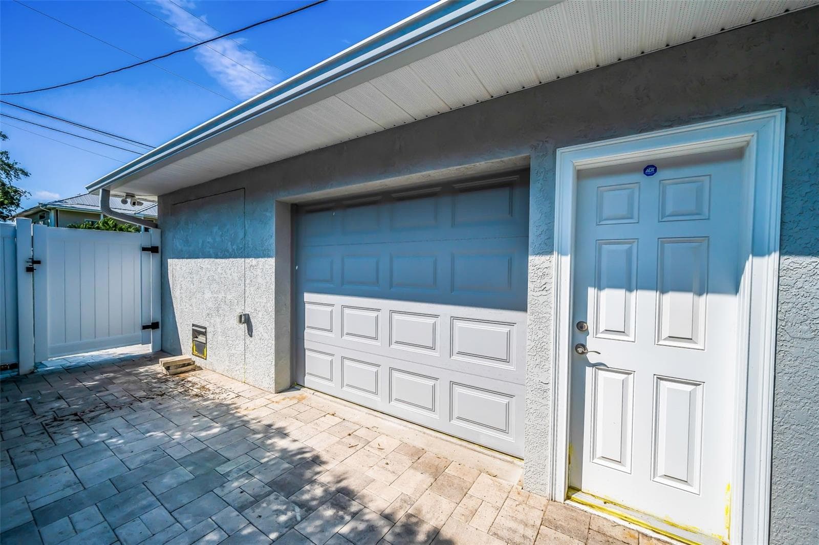 Back side of oversized 2 car garage - 1620 SEA BREEZE DR, TARPON SPRINGS