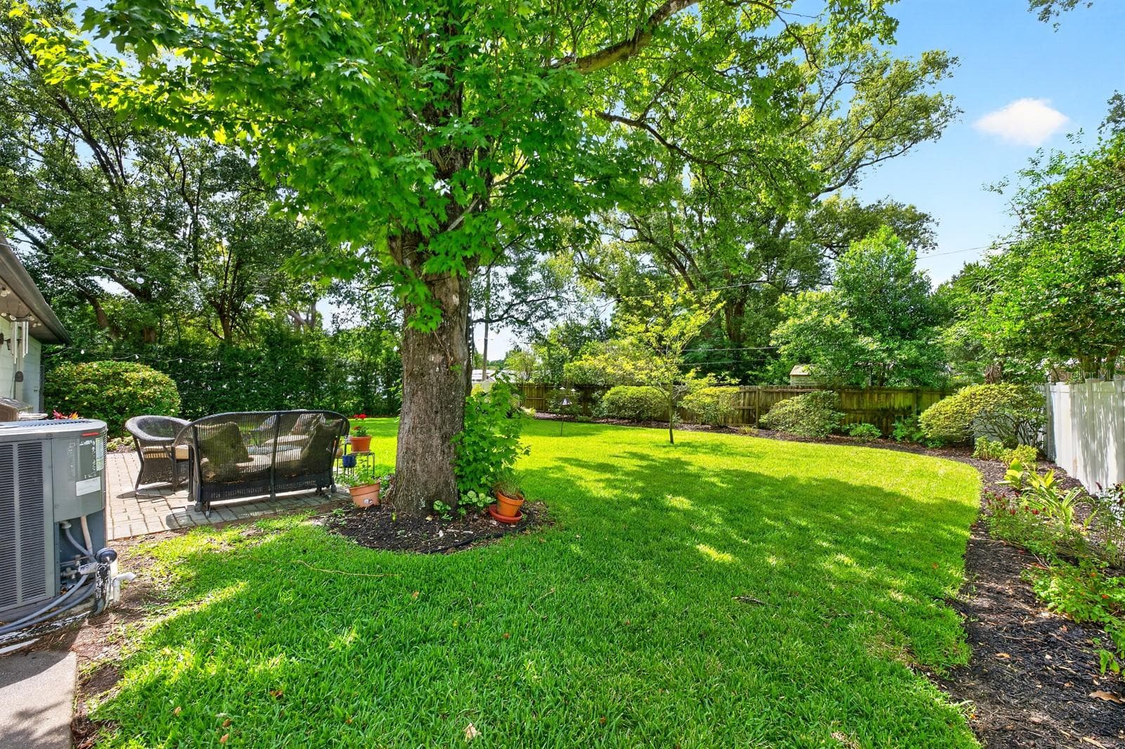 A brick patio creates the perfect outdoor gathering space. - 2706 HARGILL DR, ORLANDO