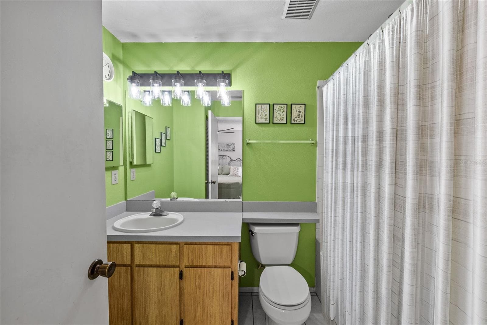 Primary bathroom with vanity and great storage. - 8601 TWIN FARMS PL, TAMPA