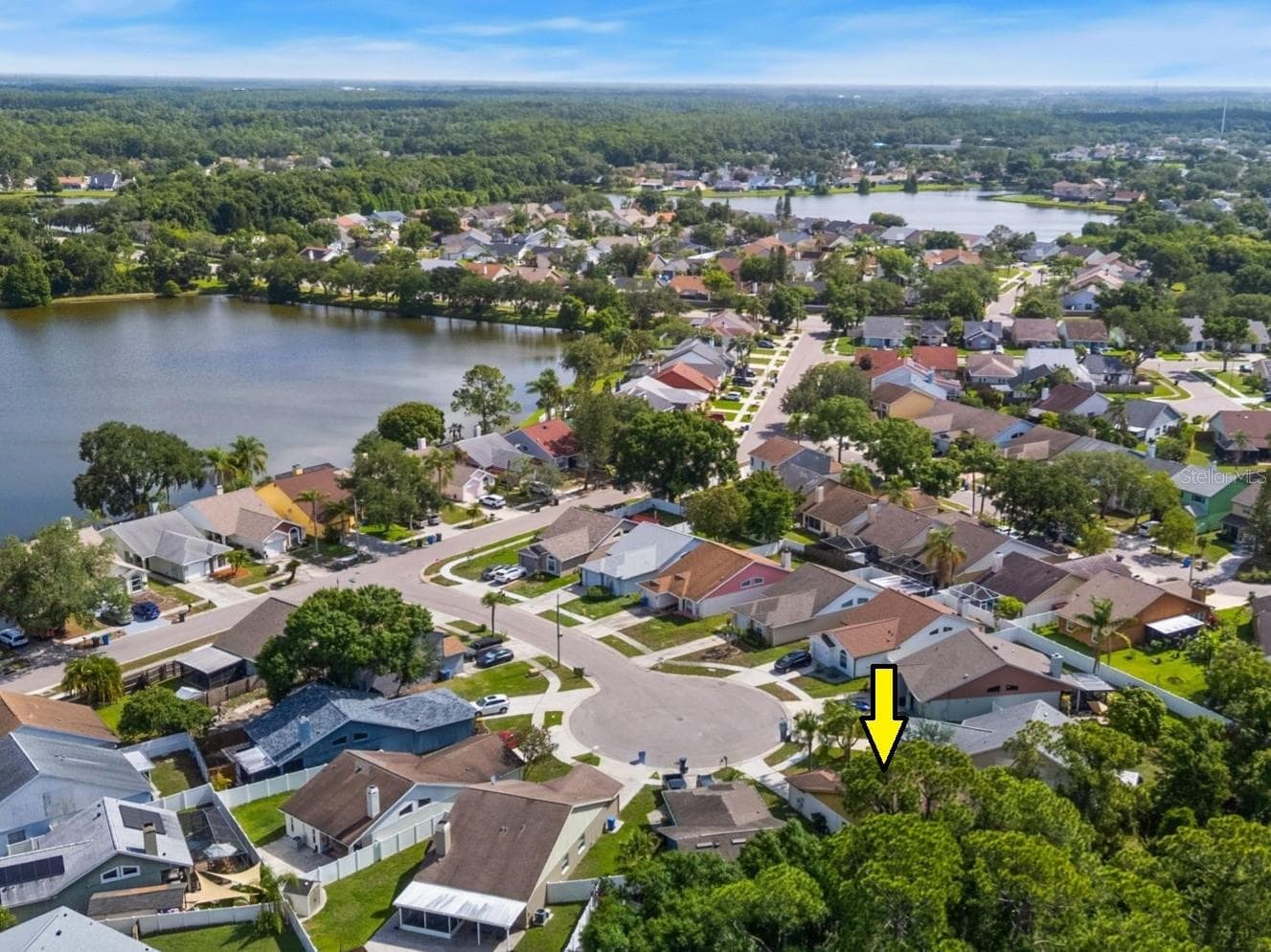 Aerial neighborhood view near lakes, green space, and Countryway amenities. - 8601 TWIN FARMS PL, TAMPA