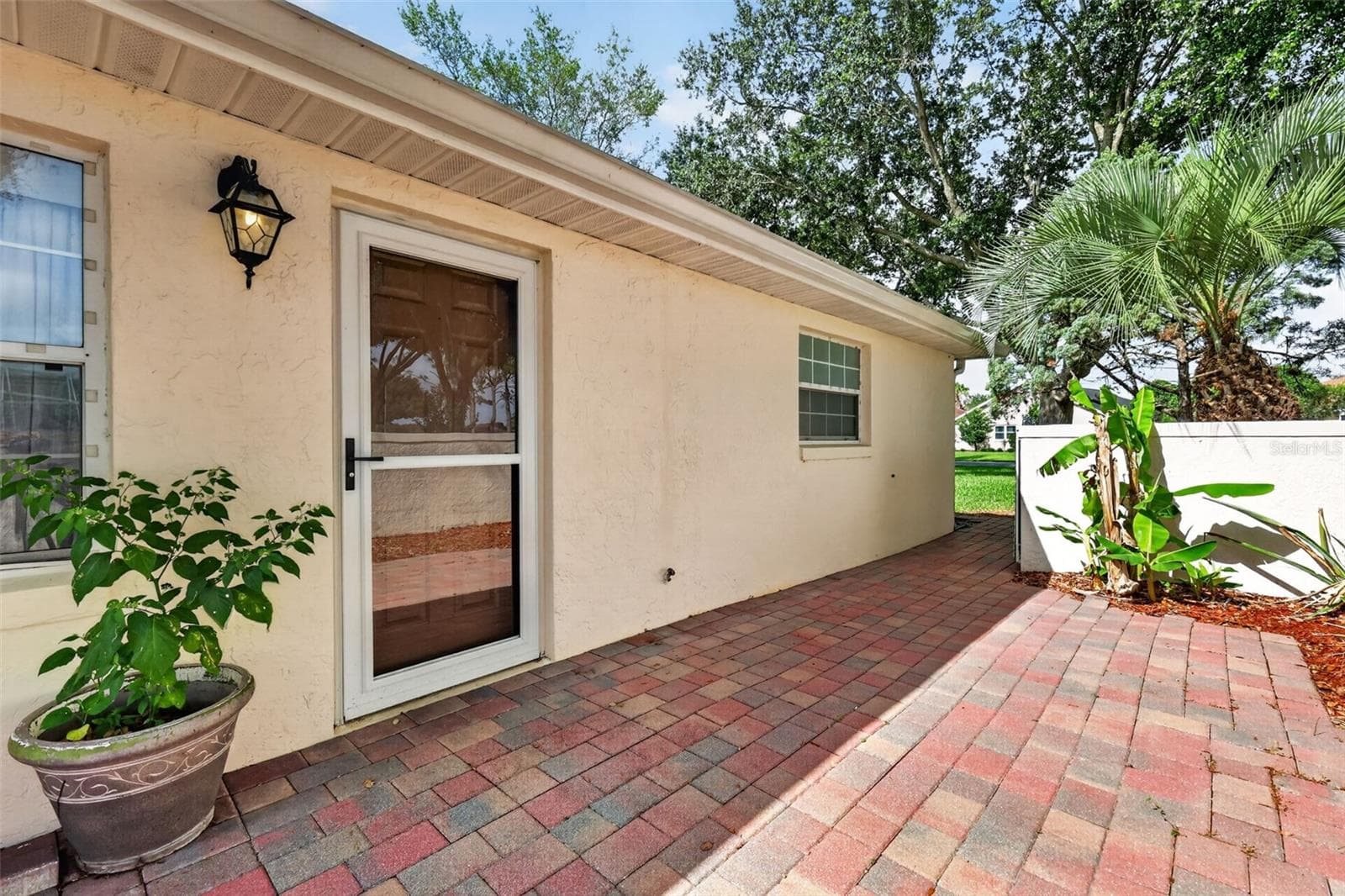 Entrance from great room to court yard. - 17808 SE 115TH CT, SUMMERFIELD
