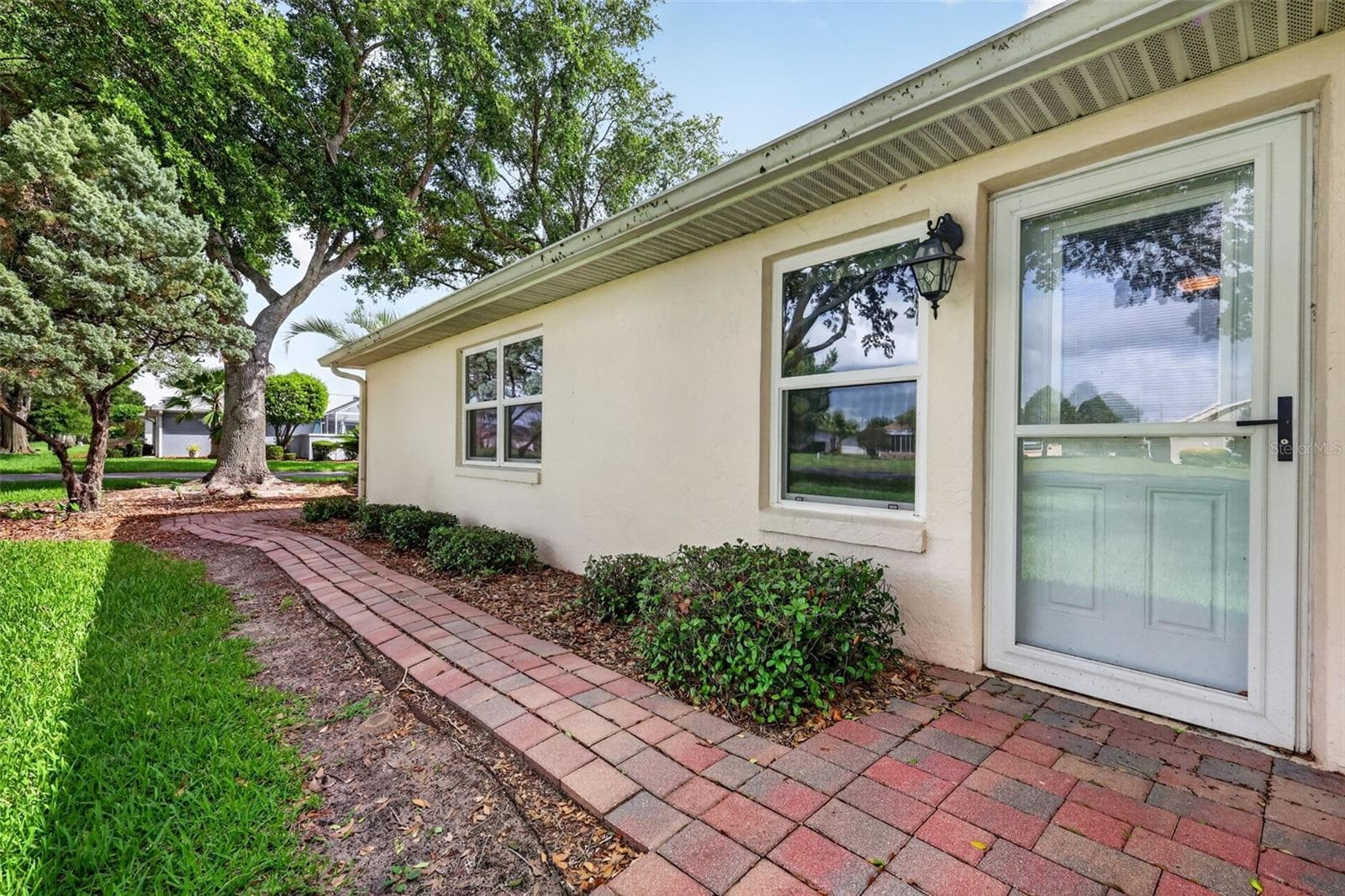 Rear entrance to family room. - 17808 SE 115TH CT, SUMMERFIELD