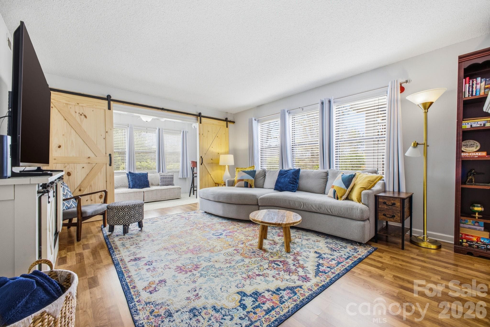 Living area, looking in to the sun room - 2305 Abbey Circle, Asheville