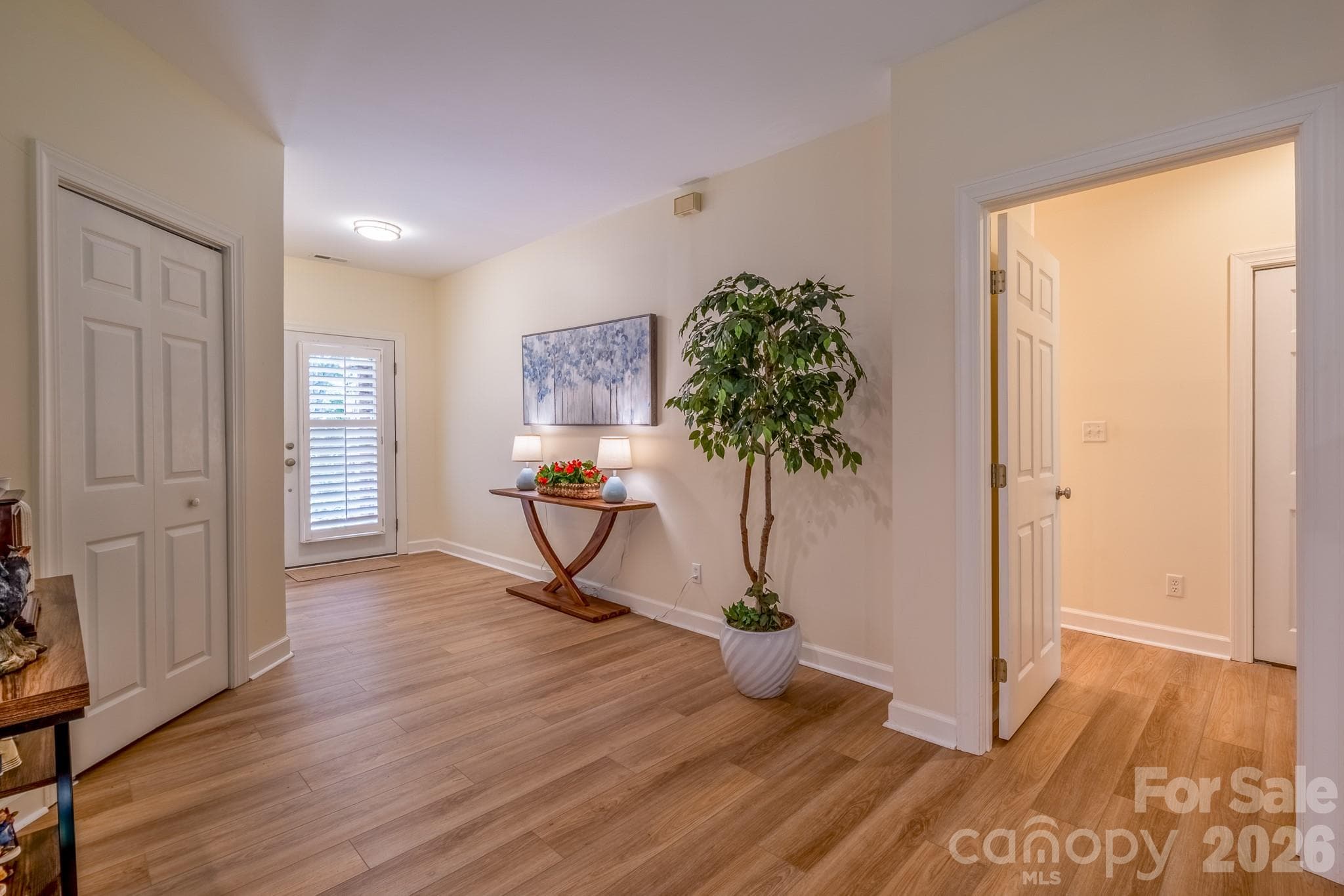 Wide Foyer & Entry Hall – Expansive entry hall with updated flooring, neutral finishes, and welcoming transition into the home’s open living spaces. - 99 Ridgetop Circle, Brevard