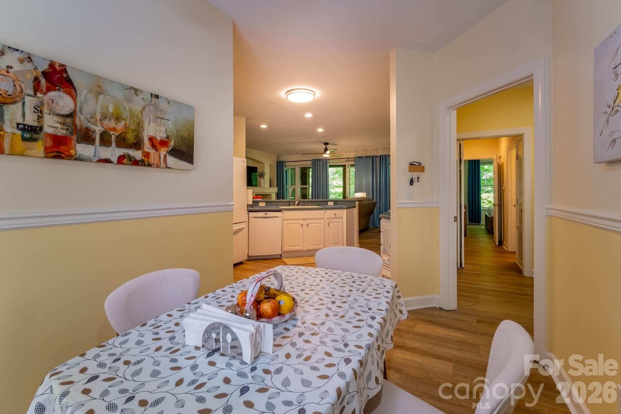 Dining Area with Open Kitchen Access – Bright dining space conveniently positioned adjacent to the kitchen and open living area, ideal for casual meals or entertaining guests. - 99 Ridgetop Circle, Brevard