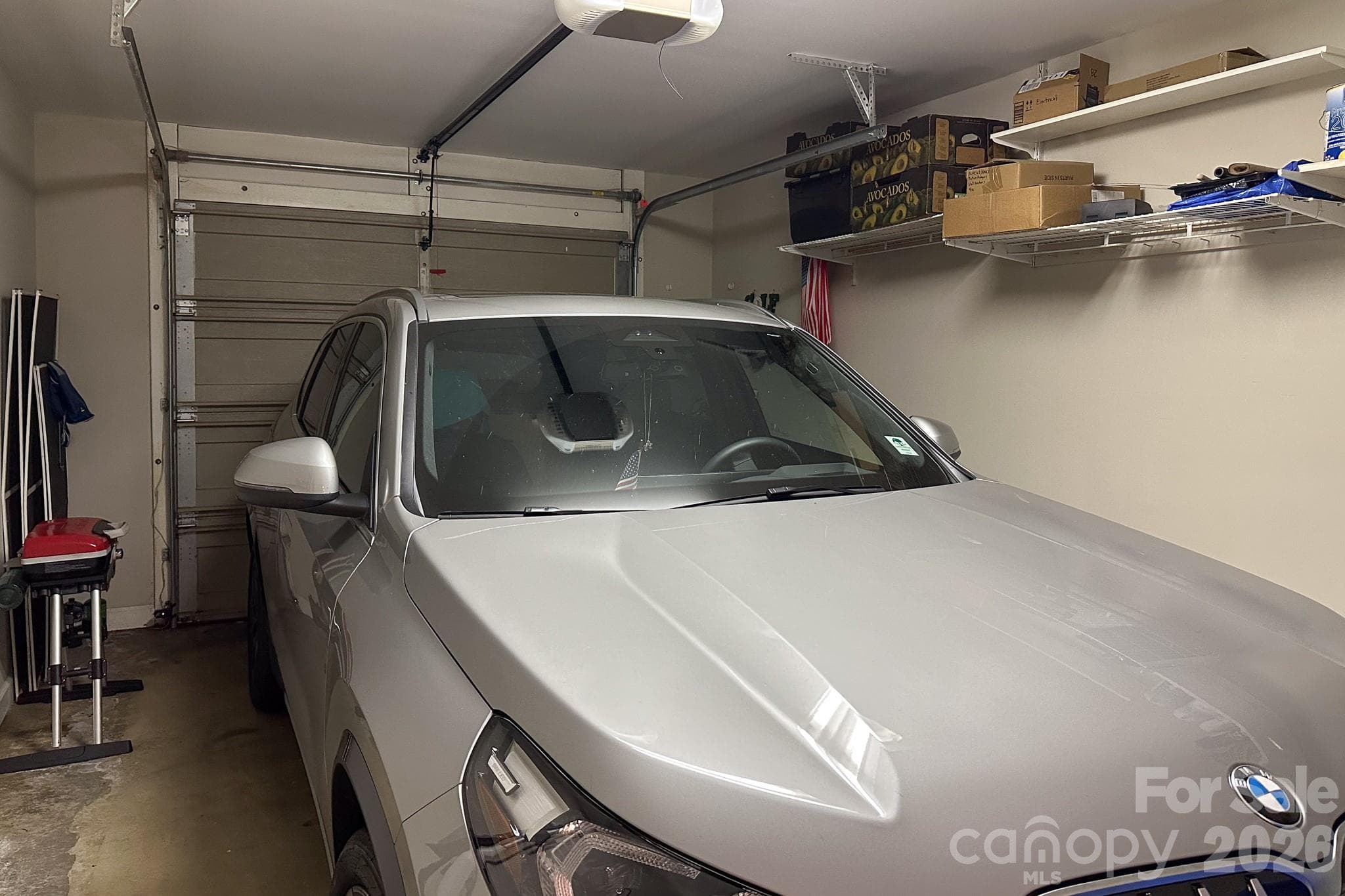 Private One-Car Garage – Attached one-car garage offering secure parking, overhead storage, and additional space for tools or seasonal items. - 99 Ridgetop Circle, Brevard