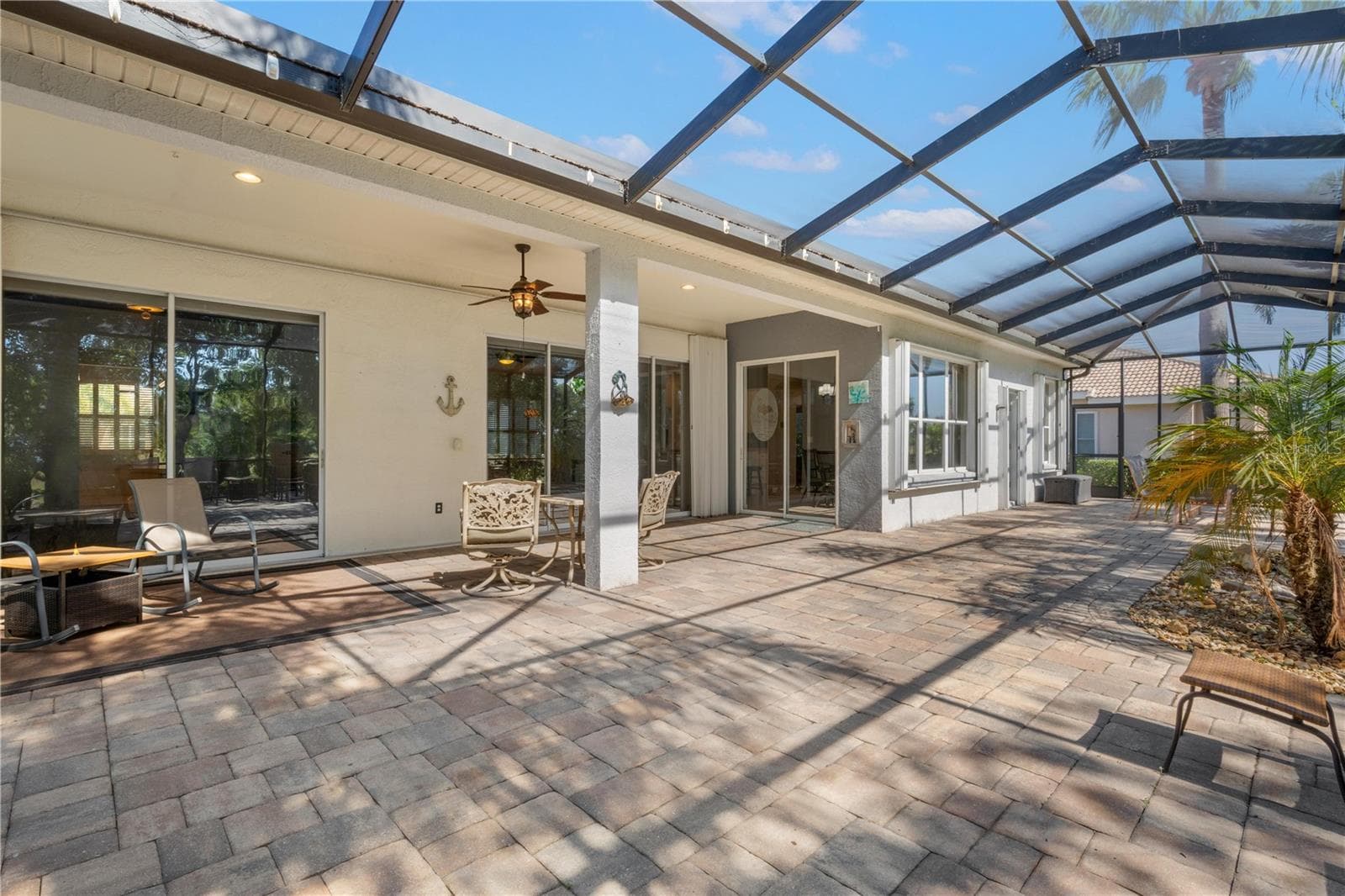 Screened Lanai - 1305 CRYSTAL GREENS DR, SUN CITY CENTER