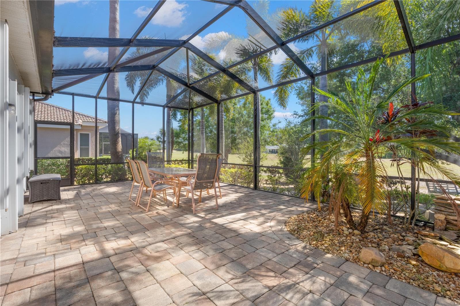 Screened Lanai - 1305 CRYSTAL GREENS DR, SUN CITY CENTER