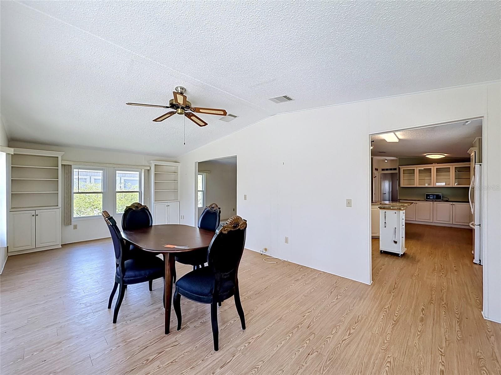 Dining Room into Kitchen - 1666 ELKHART CIR, TAVARES
