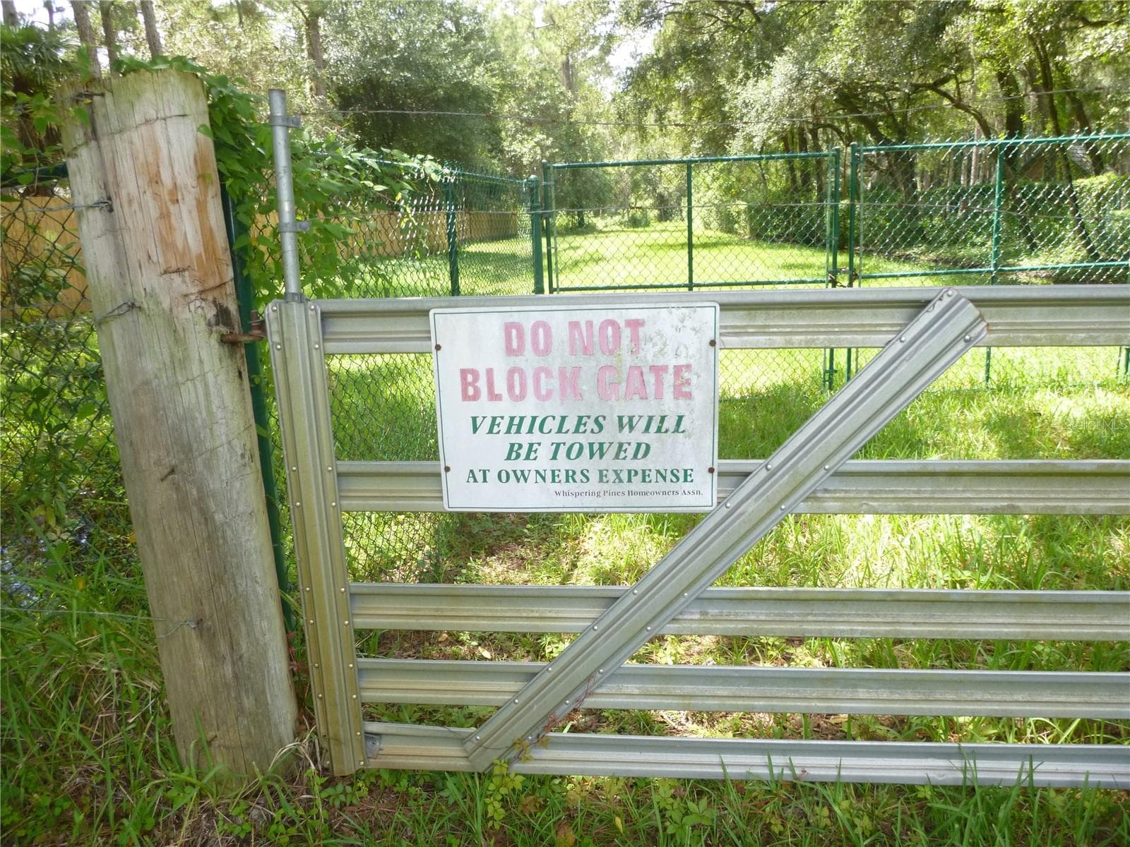 Entrance to the private 21 Acre Common Area with boardwalk to Lake Hiawatha. - 7709 WINDWARD WAY, ODESSA