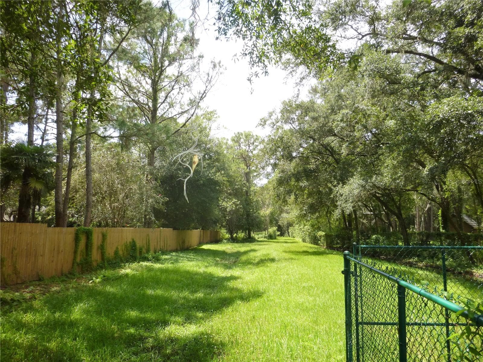 Entrance to the 21 Acre Private Common Area Park, hiking, boardwalk to Lake Hiawatha and a picnic pavilion. - 7709 WINDWARD WAY, ODESSA