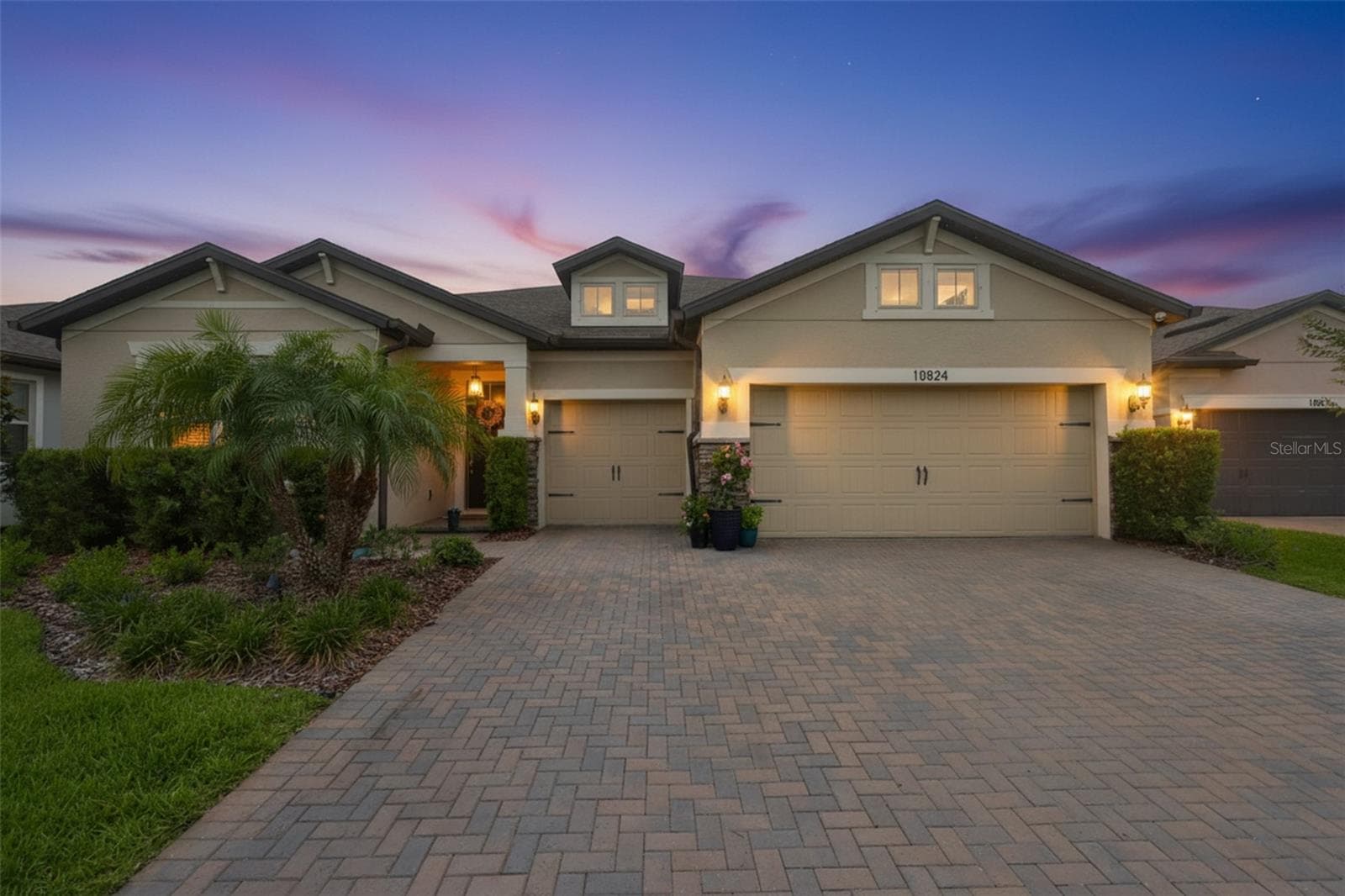 Front Elevation Twilight - 18824 ALDER GLEN DR, LUTZ