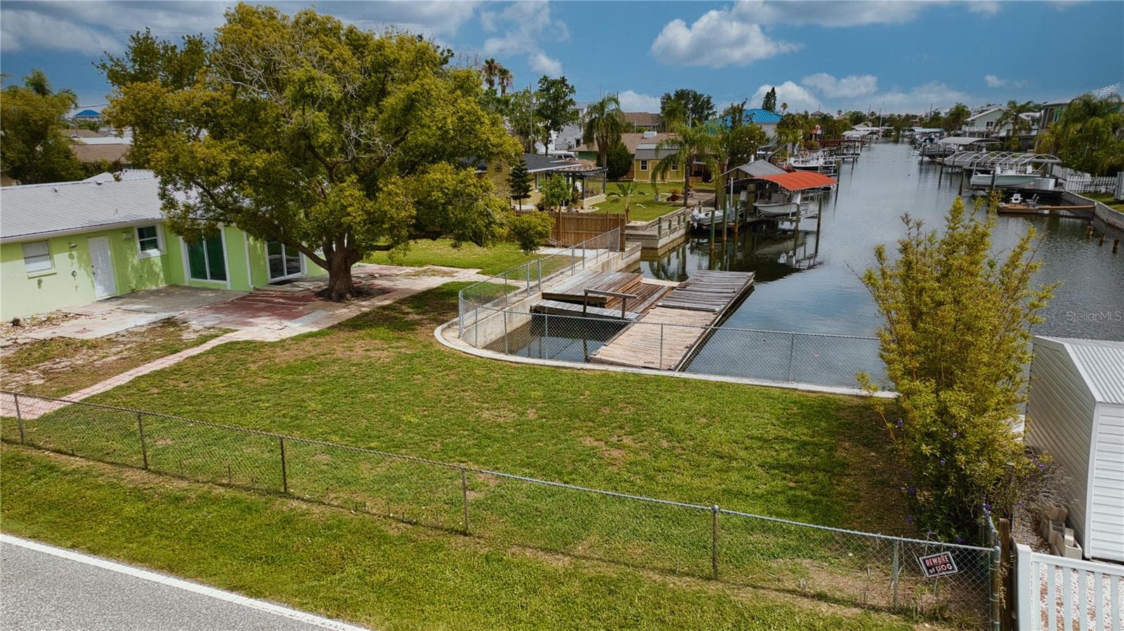 Amazing backyard green space is a definite bonus in this boating community - 13724 COX AVE, HUDSON