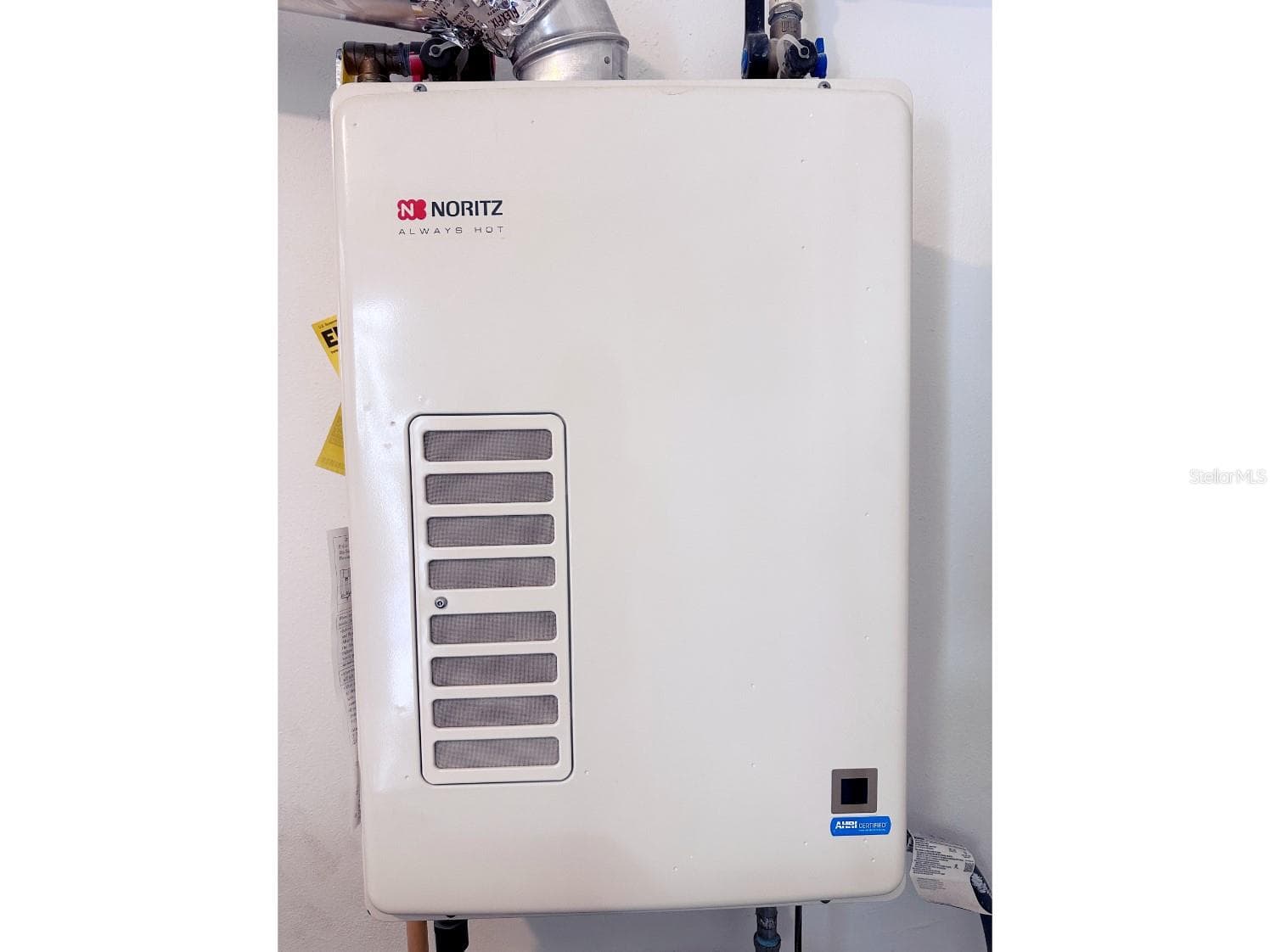 Tankless Hot Water Heater in laundry Room - 155 112TH AVE #A, TREASURE ISLAND