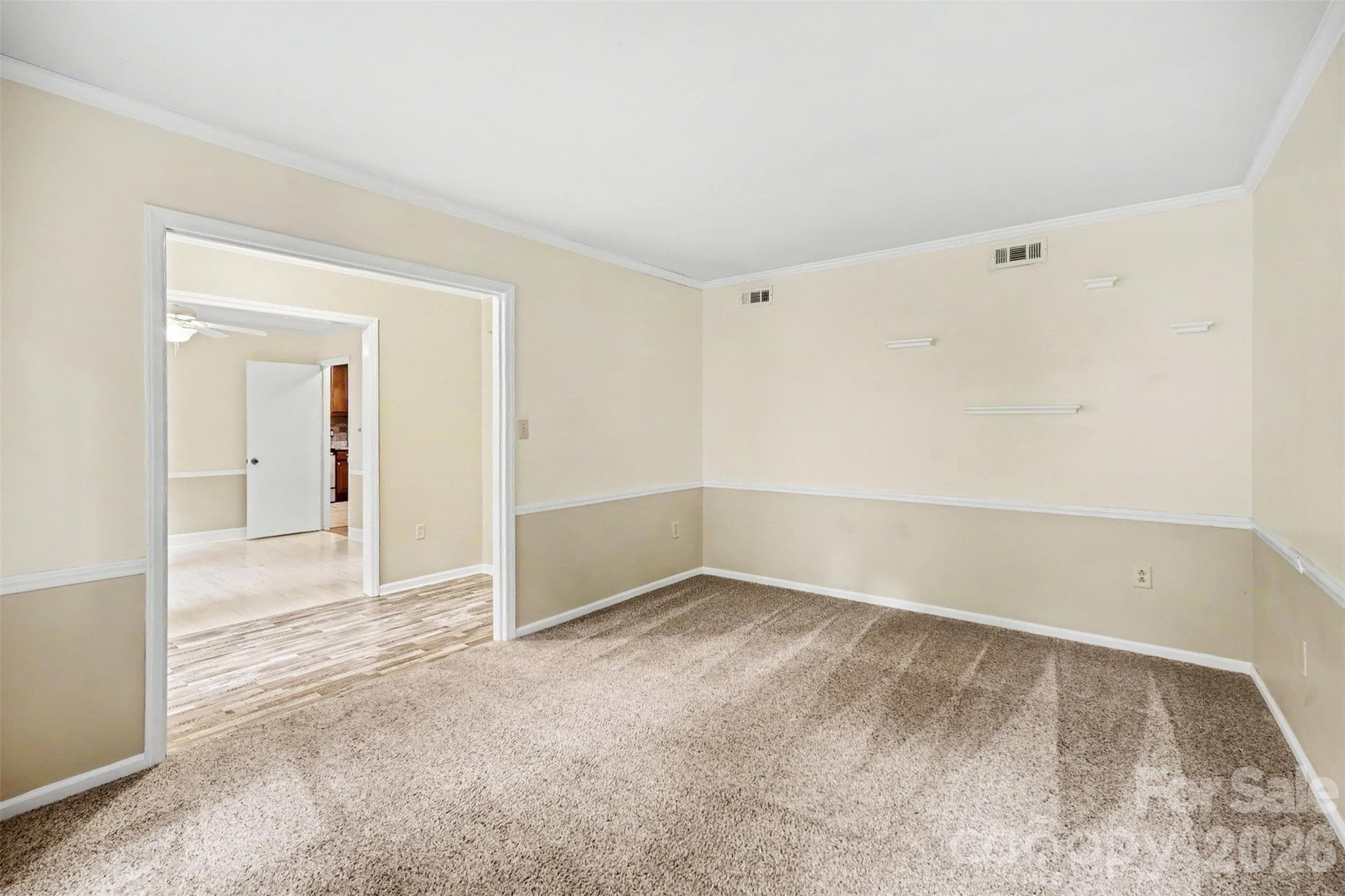First Floor features Crown Molding throughout - 8644 Kirchenbaum Drive, Charlotte
