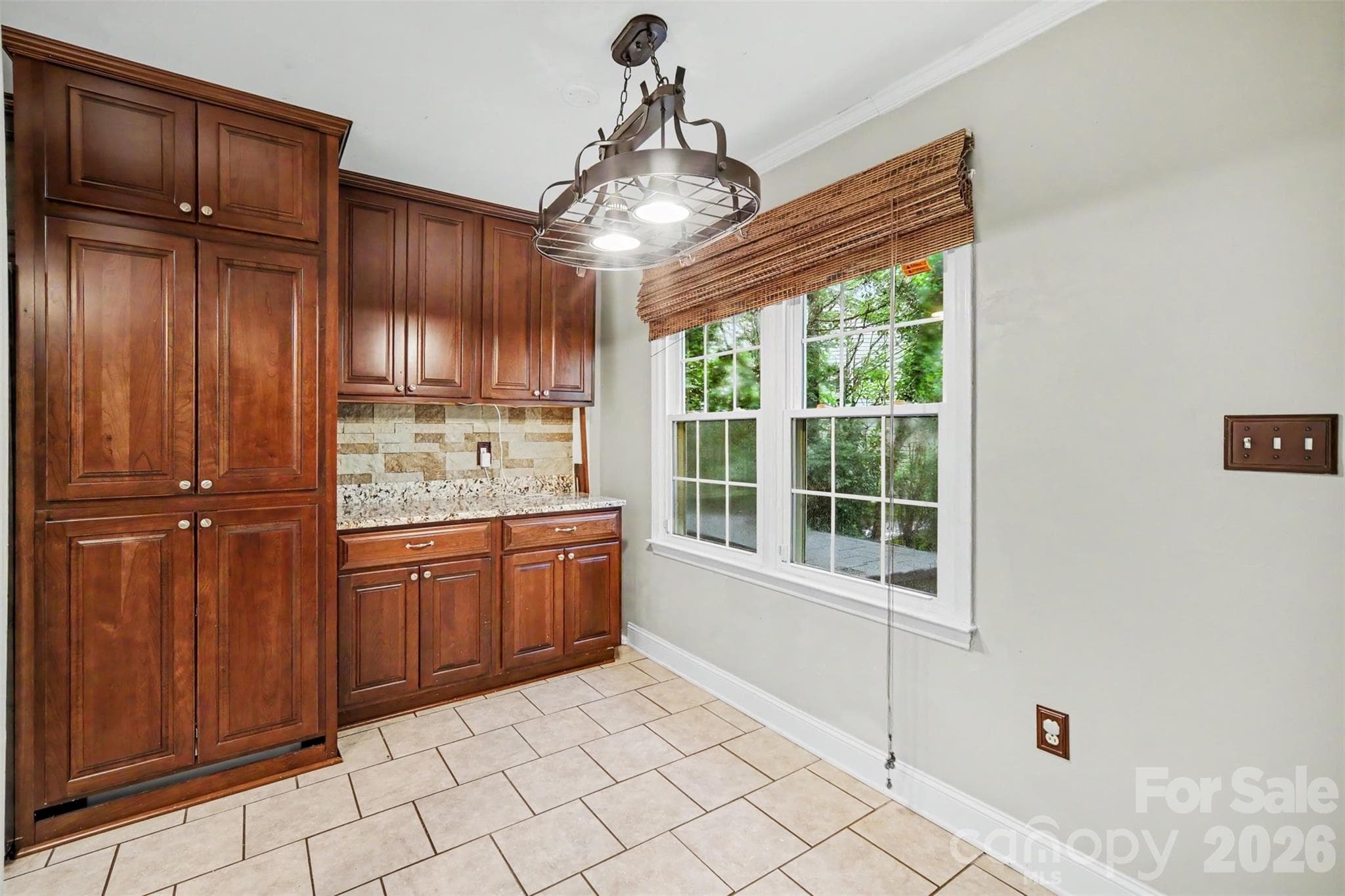 Washer and Dryer Concealed Behind Cabinetry - 8644 Kirchenbaum Drive, Charlotte
