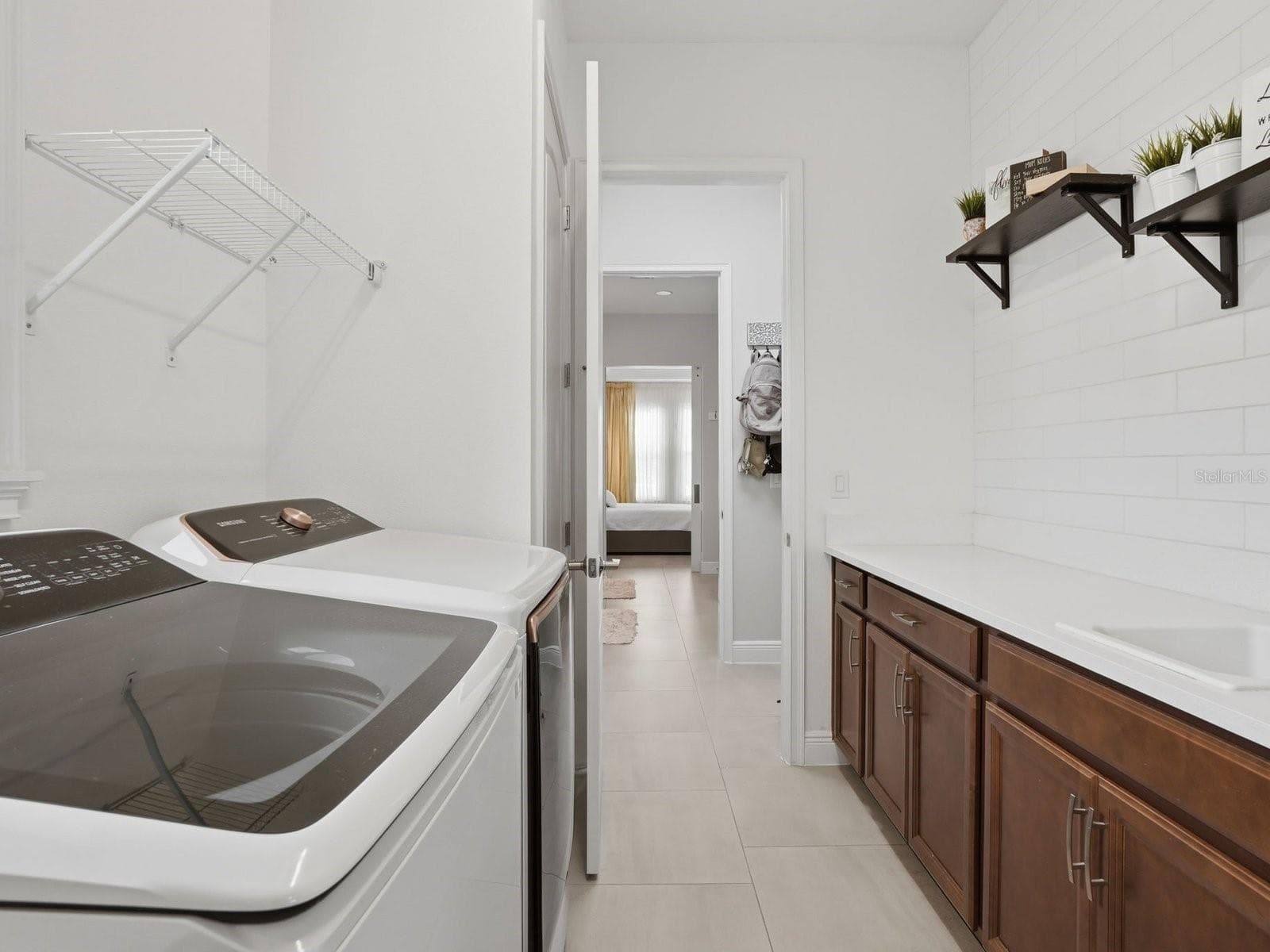 Laundry Room accessible from Primary Bathroom - 9448 MERE PKWY, ORLANDO