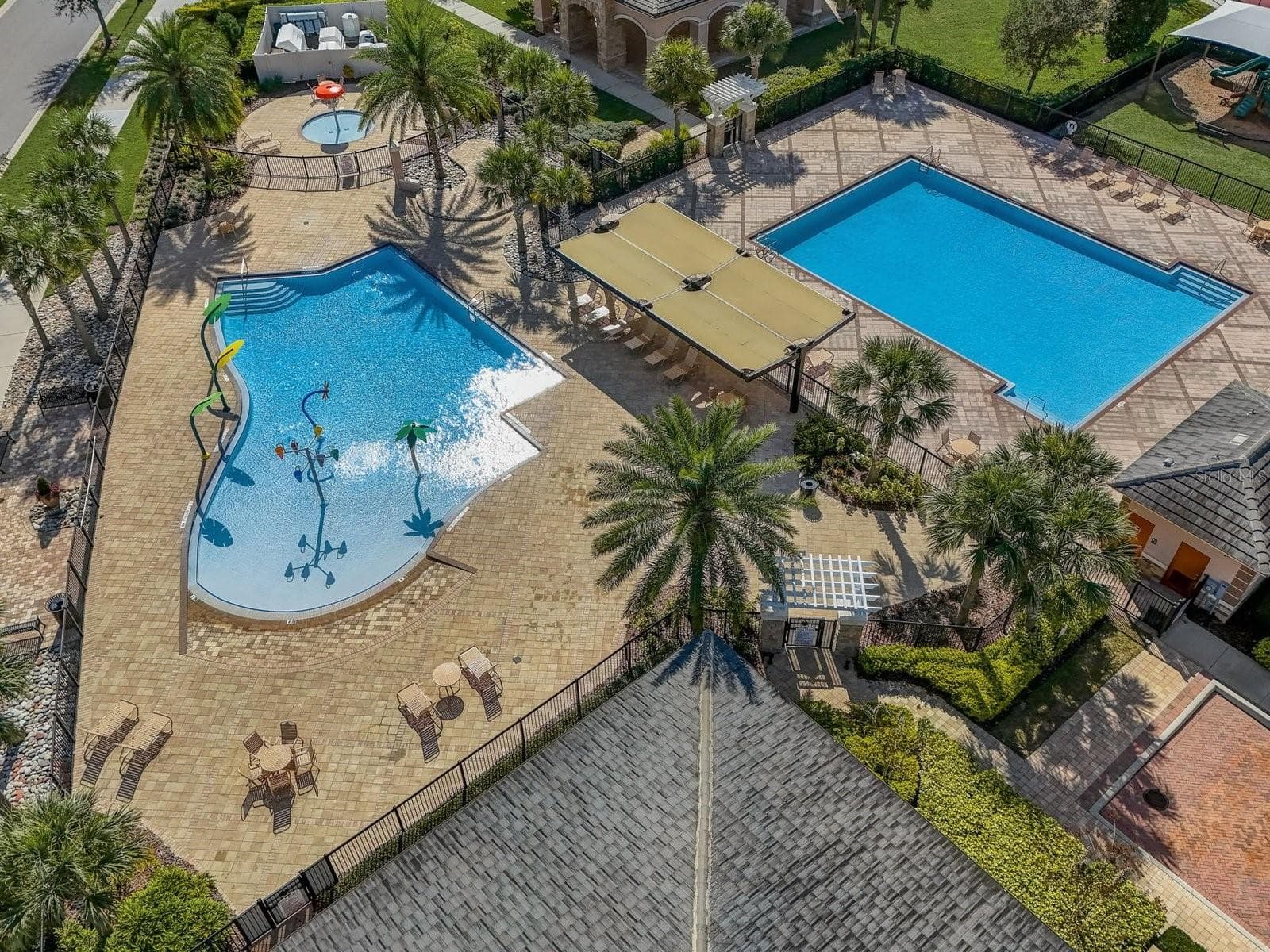 Aerial view of the community pool on Eagle Creek Center Blvd - 9448 MERE PKWY, ORLANDO