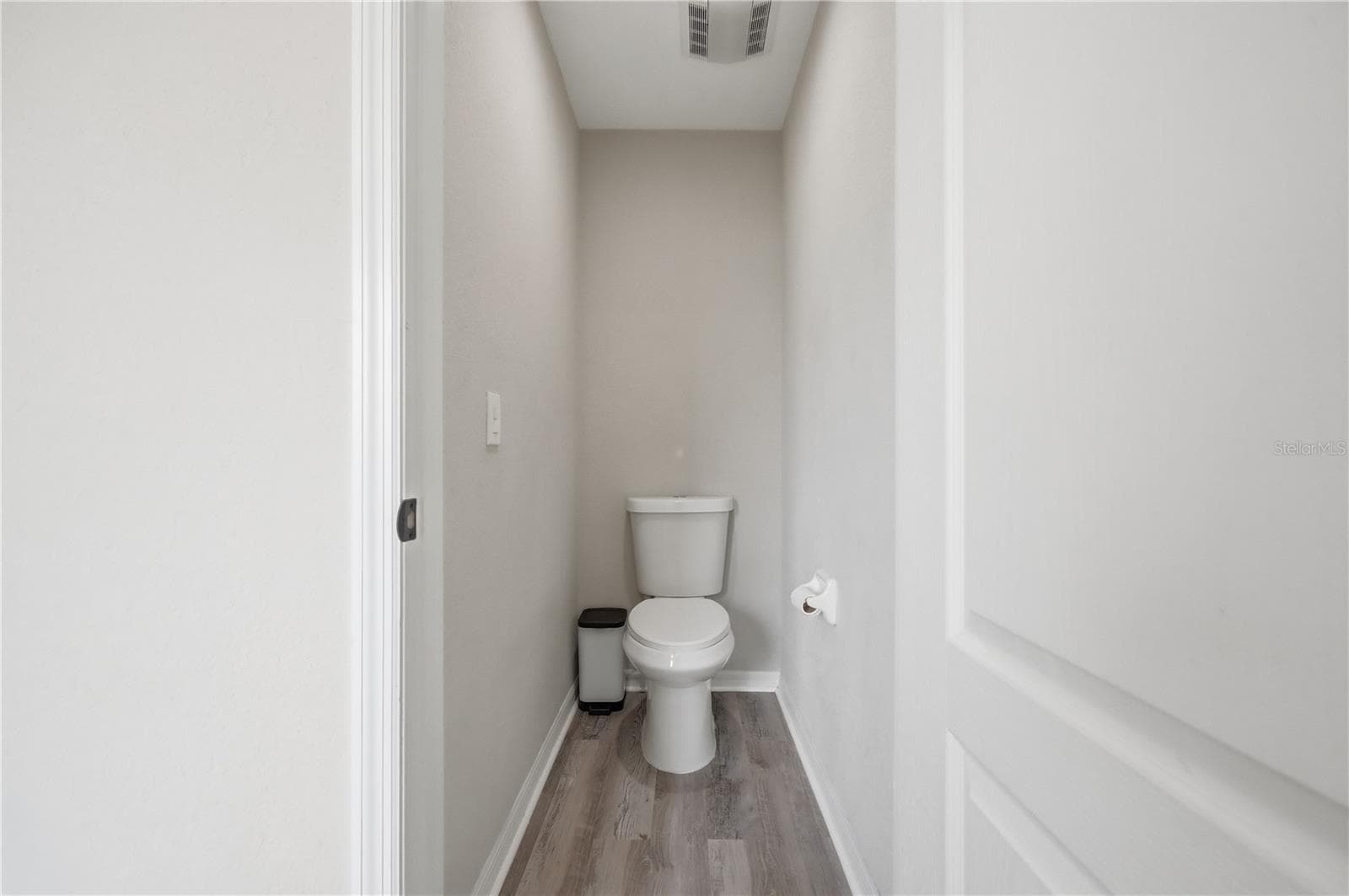 Closeted Toilet in Primary - 3097 BUCKEYE POINTE DR, WINTER HAVEN