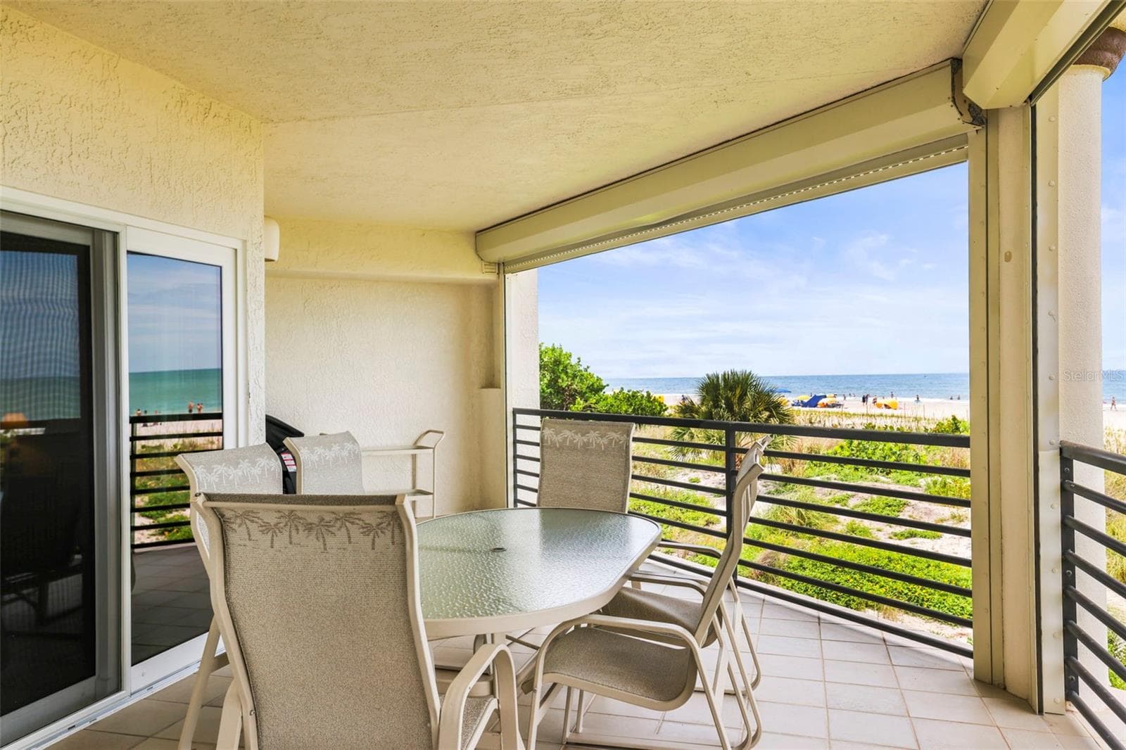 Balcony off of Main Living Area and accessible from Primary En-Suite - 200 121ST AVE #103, TREASURE ISLAND