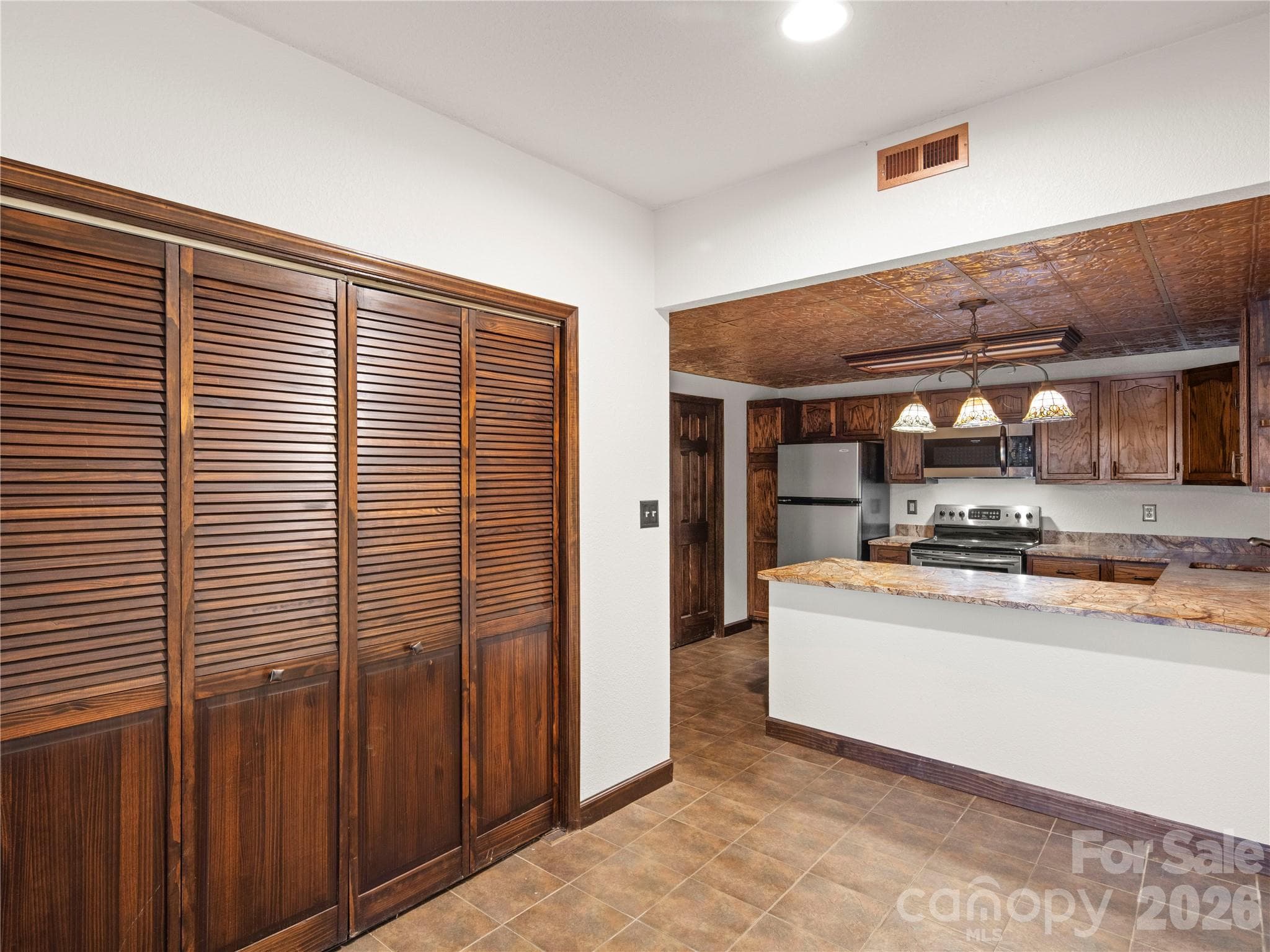 Notice the tile floor and copper ceiling - 105 Braeside Circle, Asheville
