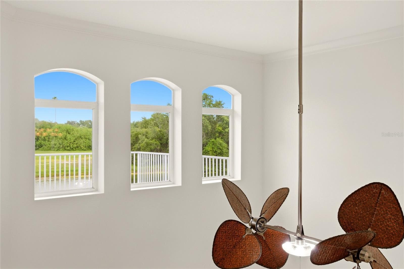 View of the lake and Misty Creek nature from the upstairs catwalk. - 8417 LONE EAGLE WAY, SARASOTA