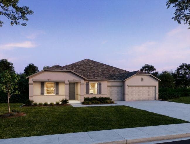 Artist Rendering at Dusk- Model home - actual features may vary. Actual home has side facing garage & metal roof! - 17041 ROYAL PALM DR, GROVELAND