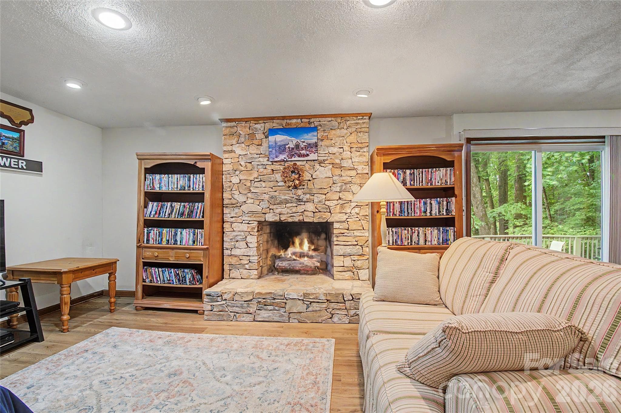 Beautiful Gas Fireplace with Stone Surround - Horse Shoe