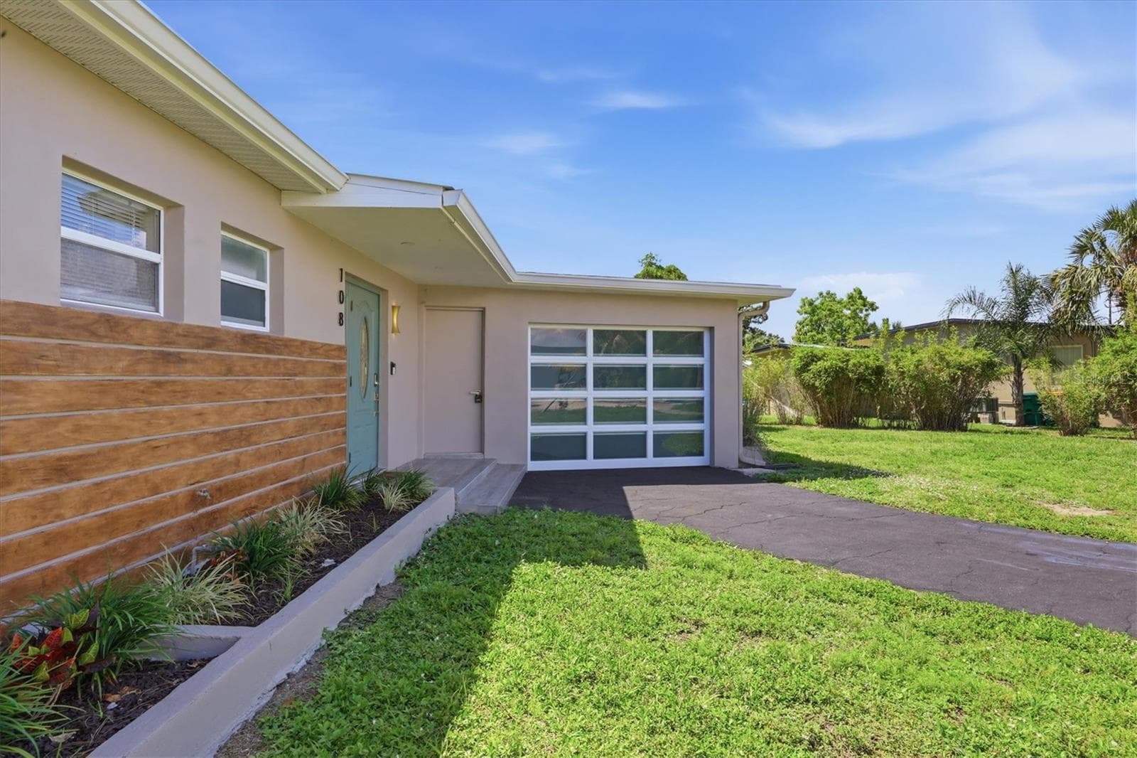 Single Family Residence at 108 BUCKEYE AVE NW, PORT CHARLOTTE, photo 2 of 53