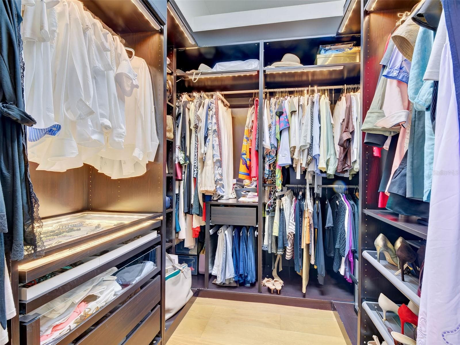 The primary bedroom walk-in closet - 5026 HANGING MOSS LN, SARASOTA