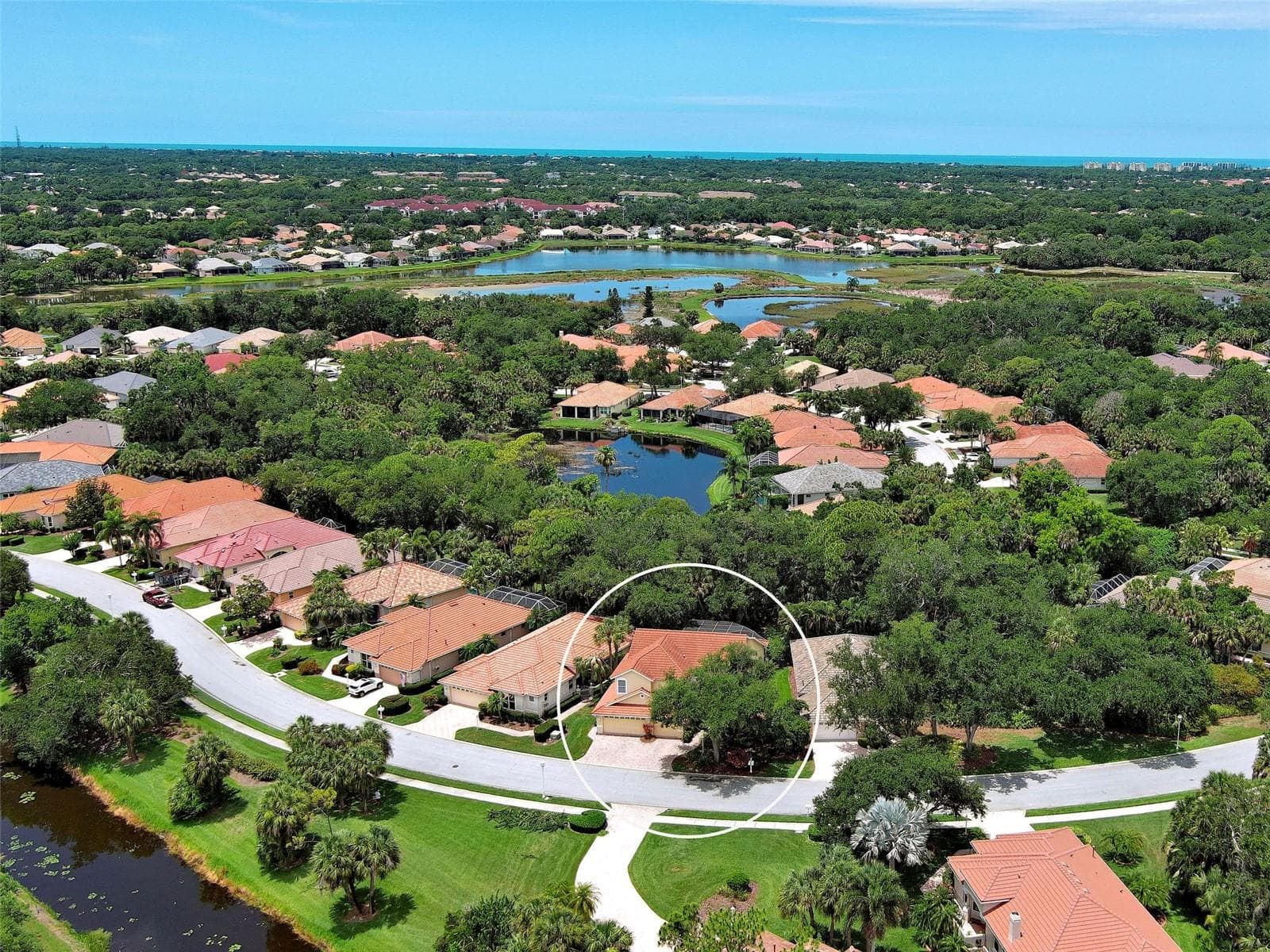 An aerial view of the home and neighborhood. - 5026 HANGING MOSS LN, SARASOTA