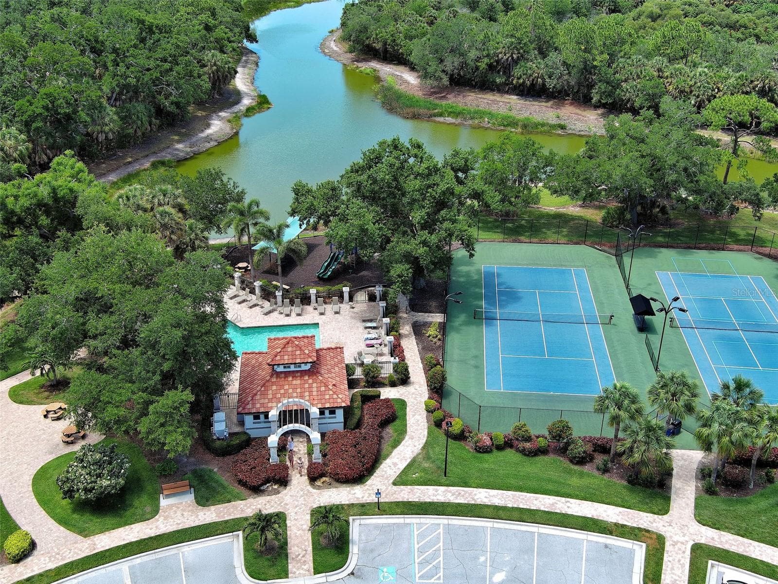 An aerial view of the community center and tennis courts. - 5026 HANGING MOSS LN, SARASOTA